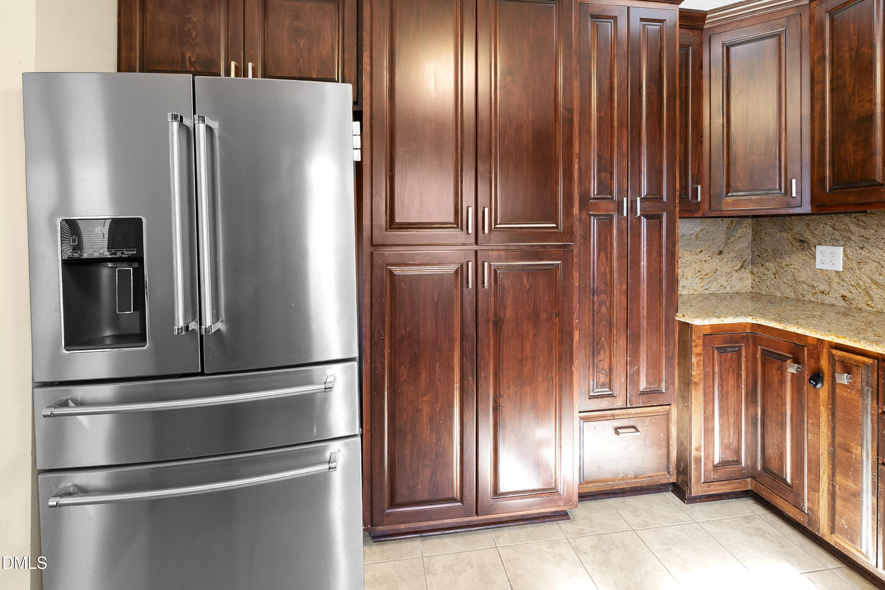 5575 Straw Pond School Road Godwin, NC 28344 - Photo 40 of 66 a metallic refrigerator freezer sitting in a kitchen