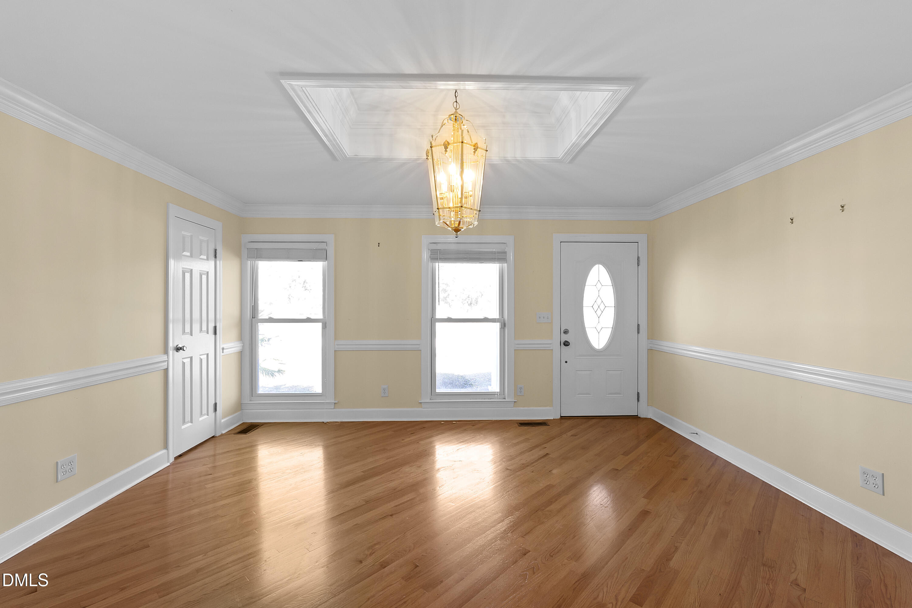 5575 Straw Pond School Road Godwin, NC 28344 - Photo 42 of 66 an empty room with wooden floor and windows