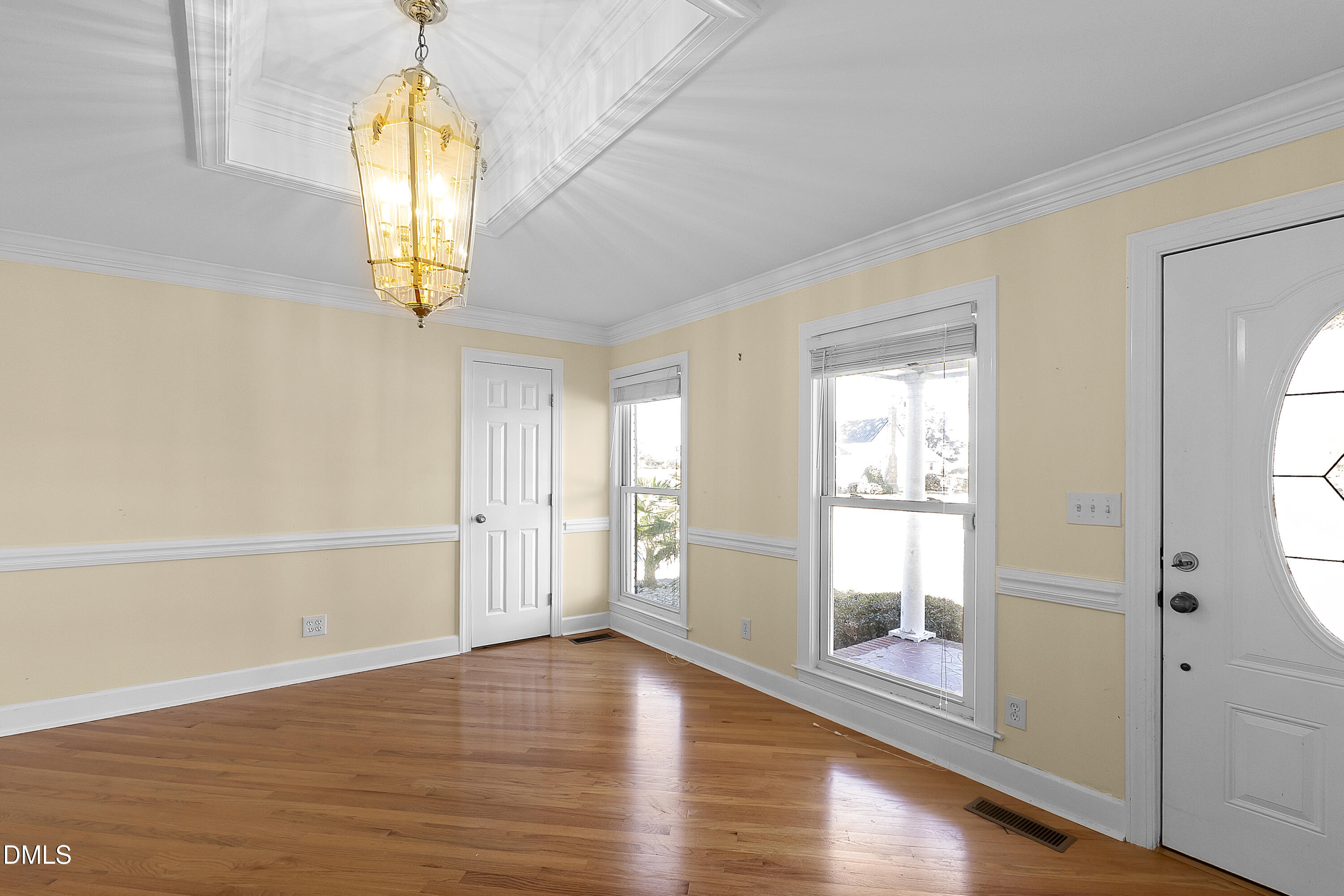 5575 Straw Pond School Road Godwin, NC 28344 - Photo 43 of 66 a view of an empty room with window and wooden floor