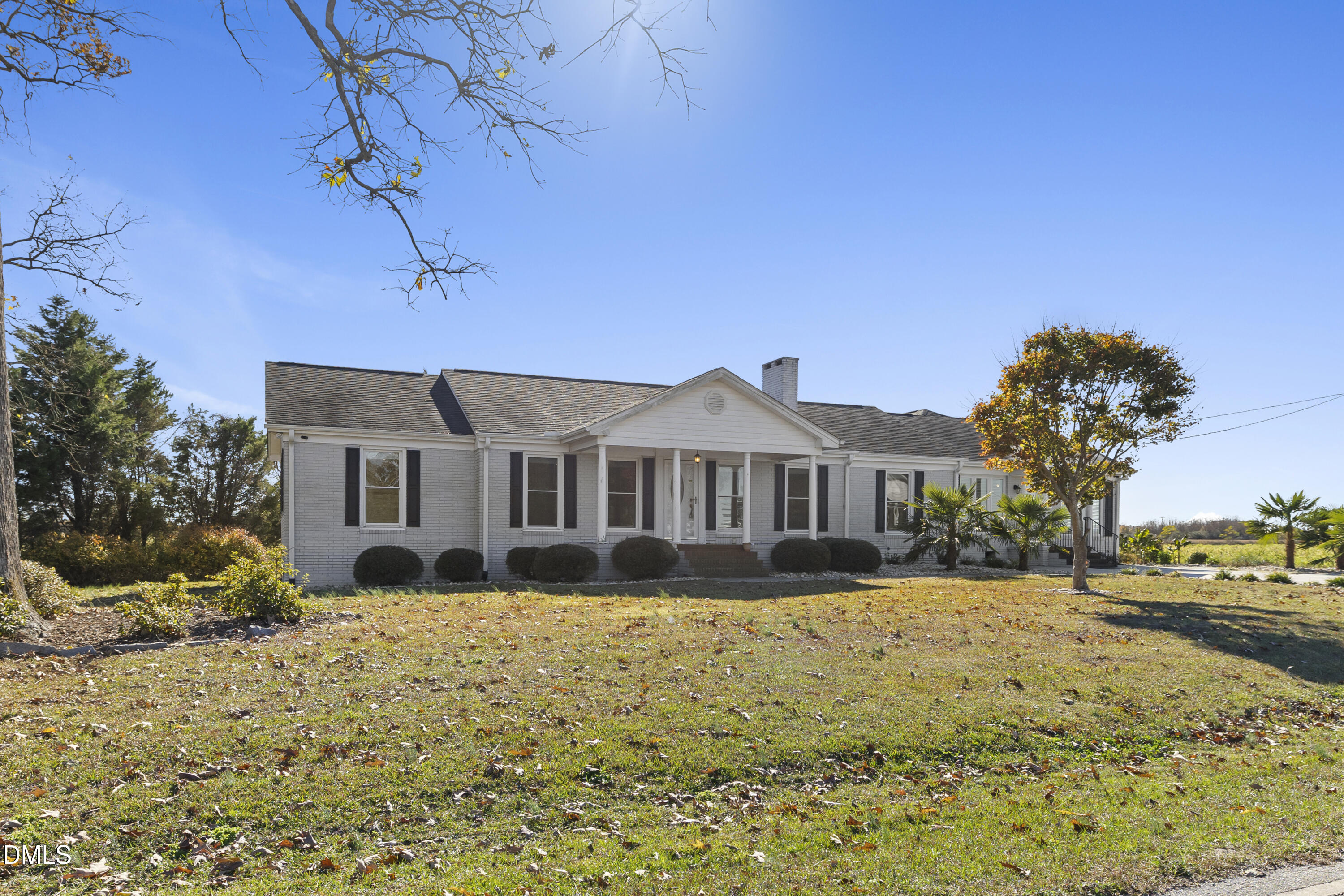 5575 Straw Pond School Road Godwin, NC 28344 - Photo 3 of 66 a front view of a house with a yard