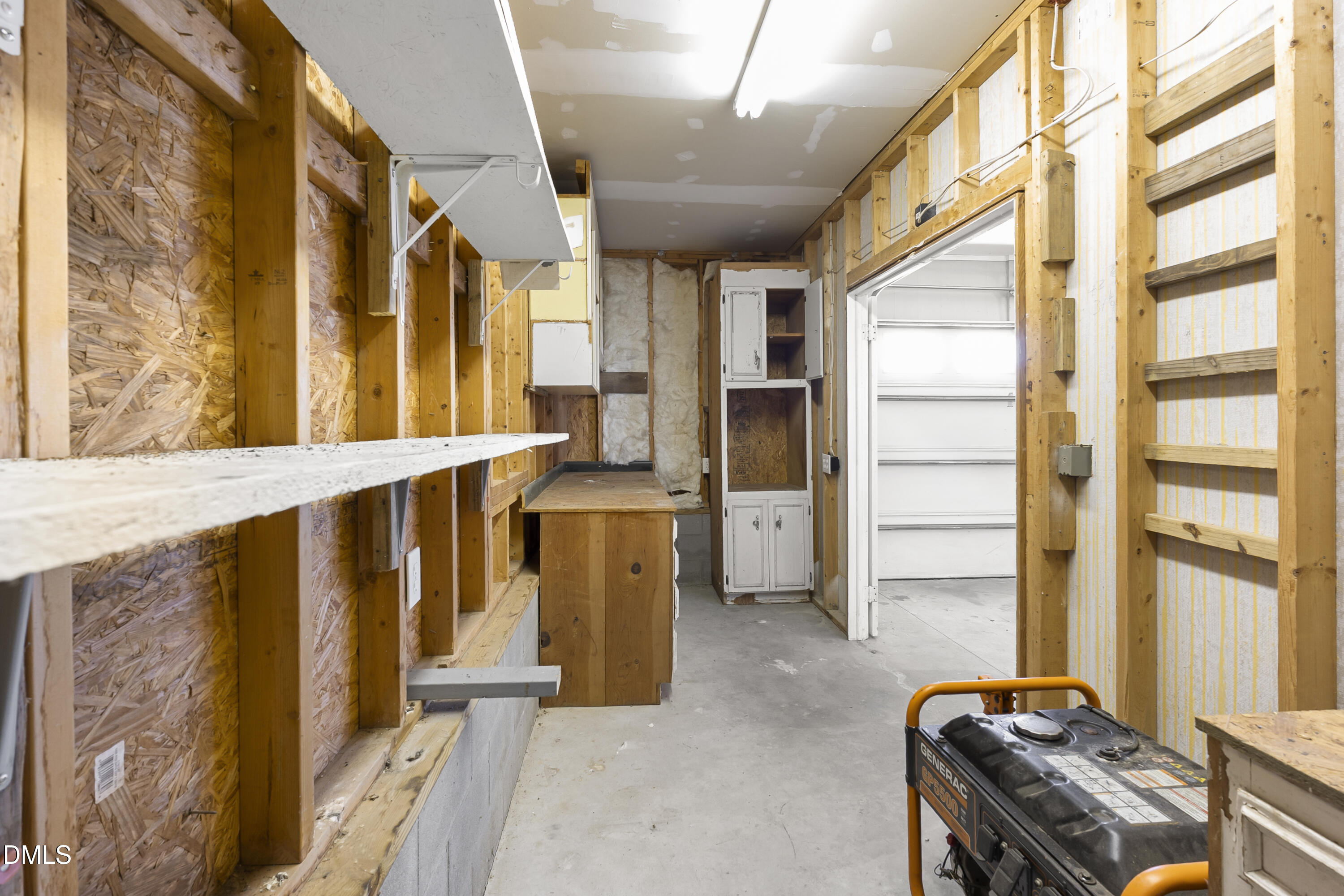 5575 Straw Pond School Road Godwin, NC 28344 - Photo 48 of 66 a view of walk in closet with window