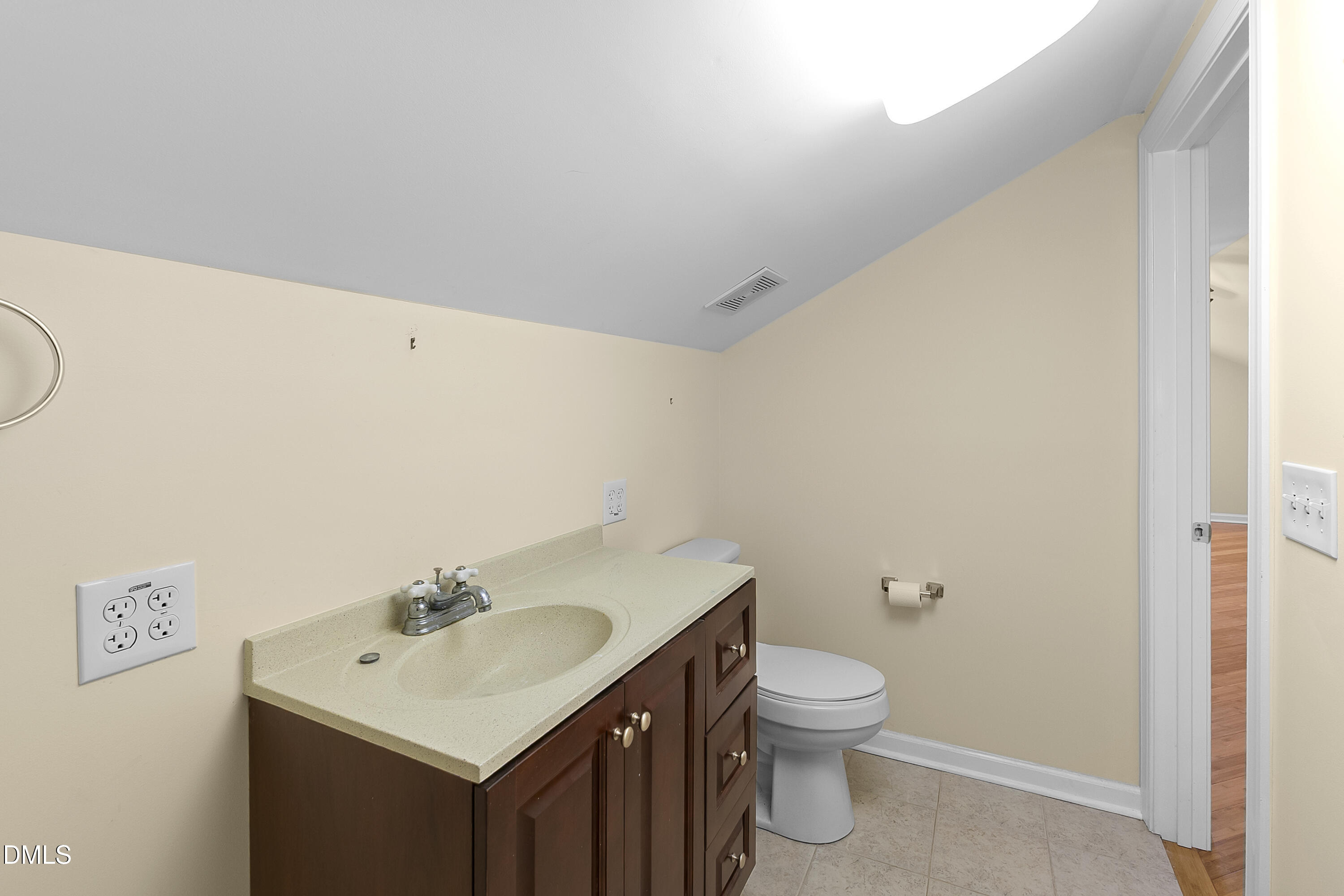 5575 Straw Pond School Road Godwin, NC 28344 - Photo 50 of 66 a bathroom with a sink toilet and a window