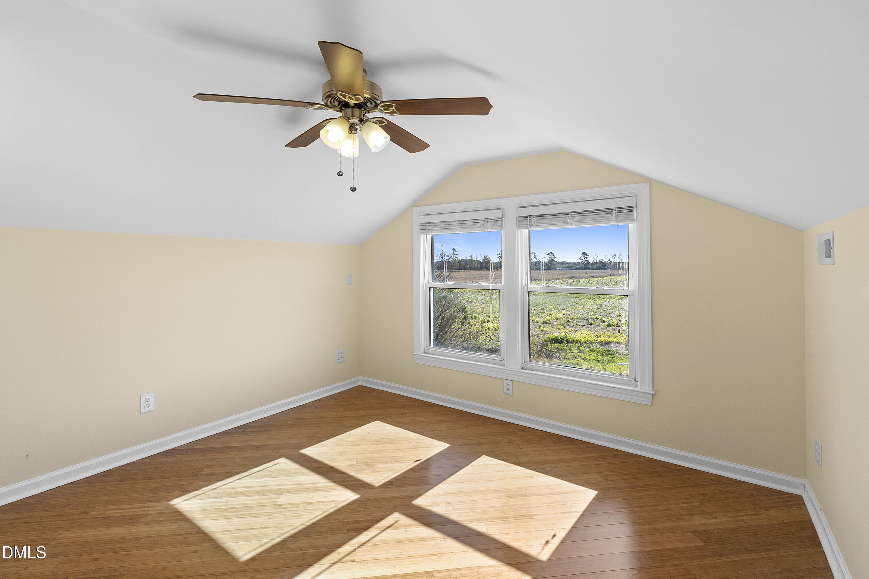 5575 Straw Pond School Road Godwin, NC 28344 - Photo 51 of 66 a view of a room with a ceiling fan and a window