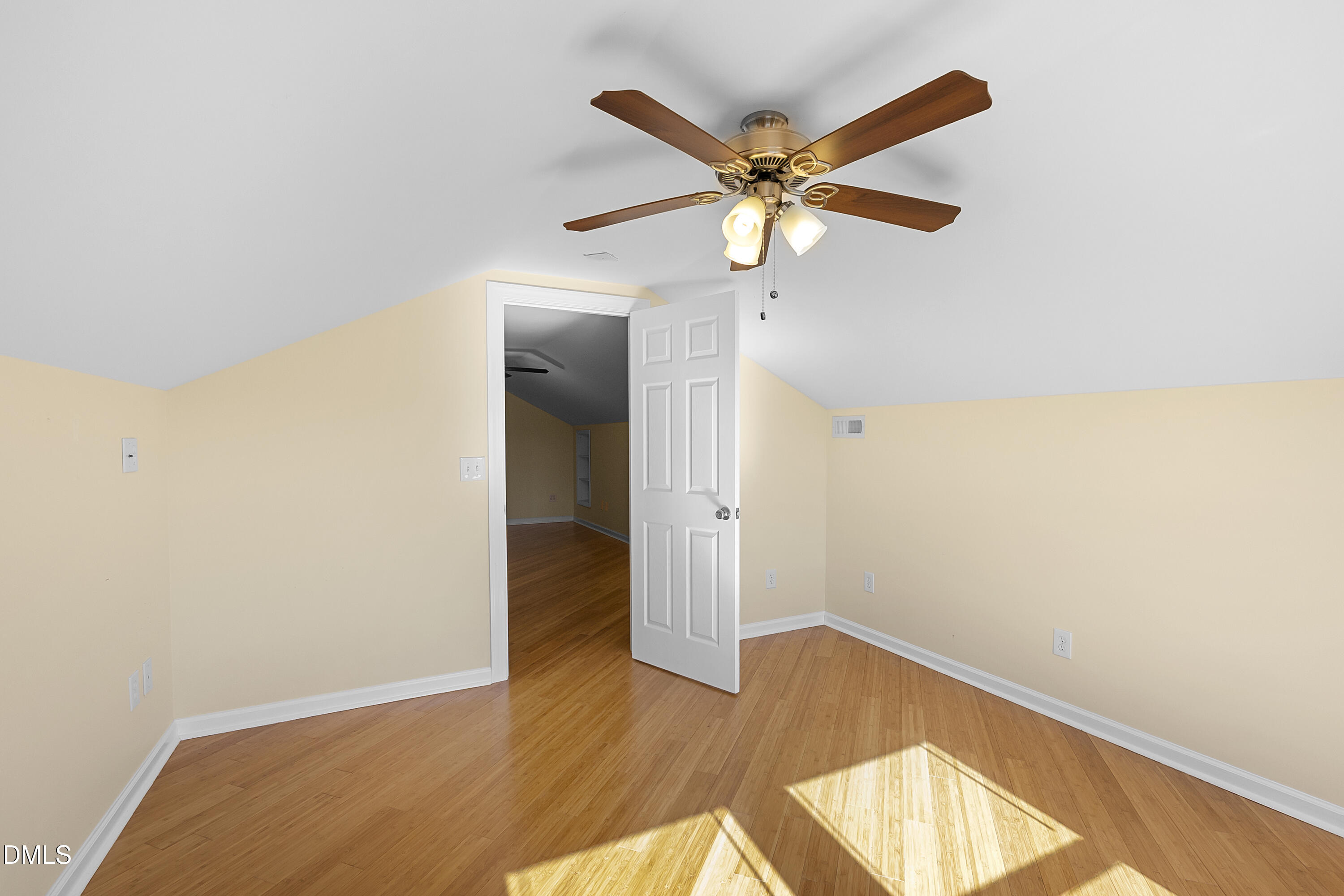 5575 Straw Pond School Road Godwin, NC 28344 - Photo 52 of 66 an empty room with wooden floor closet and fan