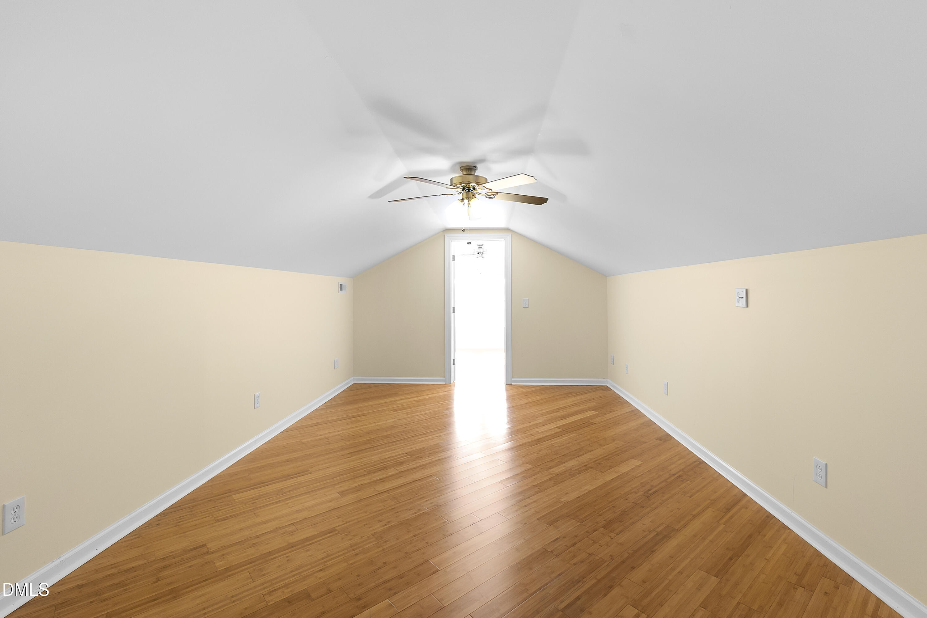 5575 Straw Pond School Road Godwin, NC 28344 - Photo 53 of 66 a view of a room with wooden floor and a ceiling fan