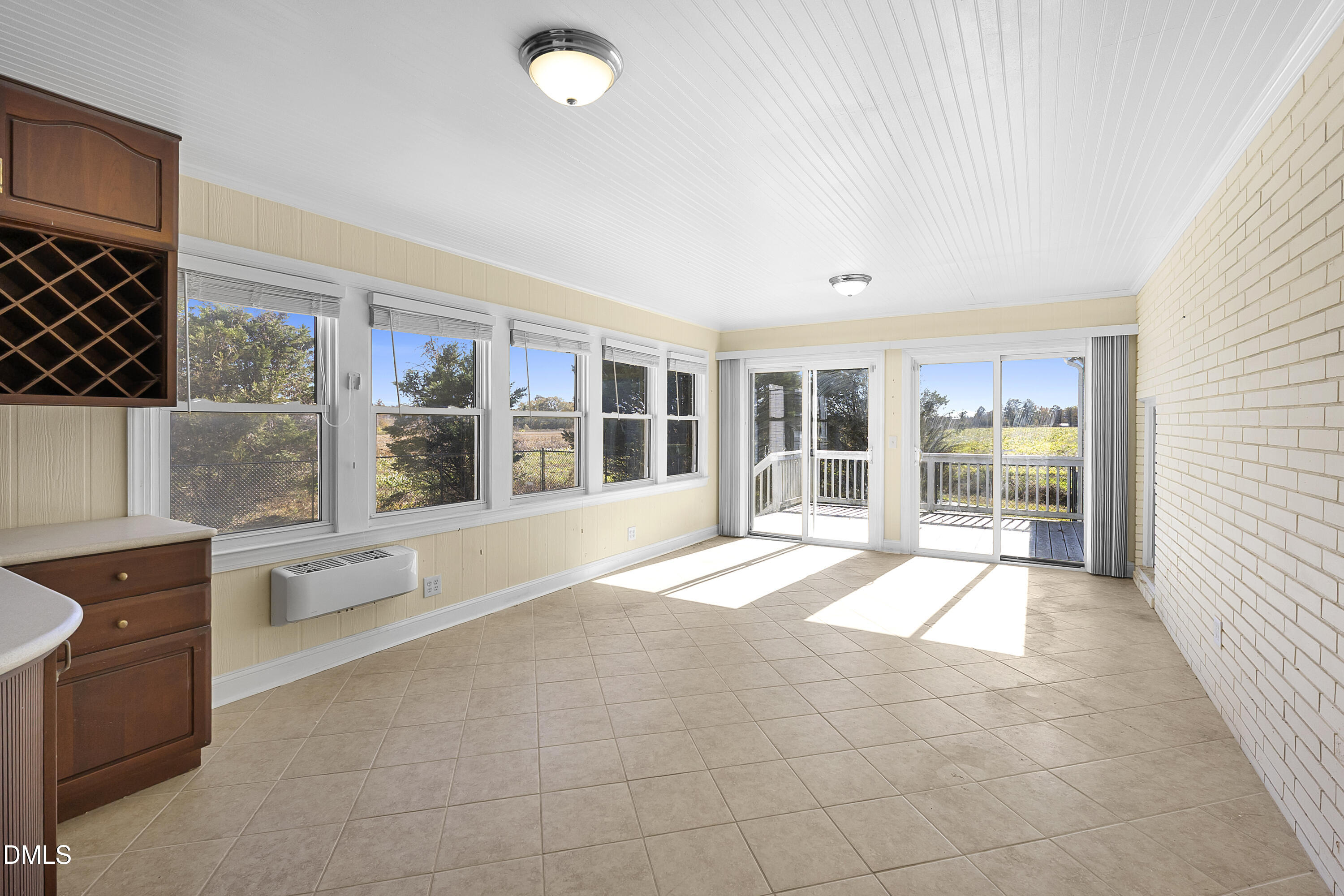 5575 Straw Pond School Road Godwin, NC 28344 - Photo 55 of 66 a large white kitchen with granite countertop a stove a sink and a granite counter tops