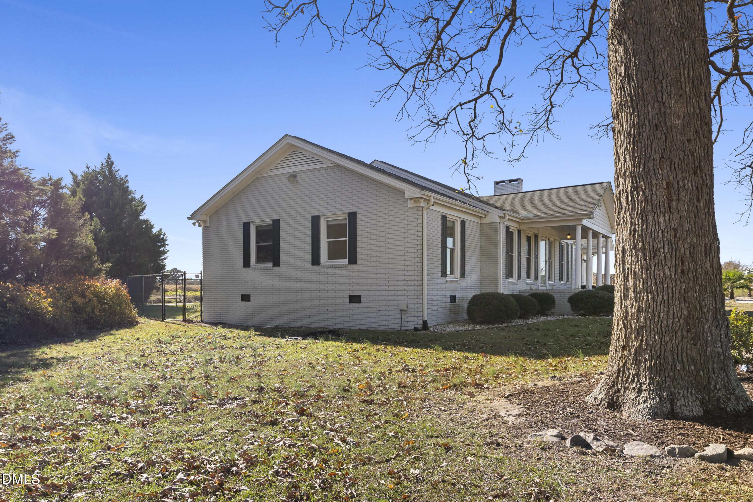 5575 Straw Pond School Road Godwin, NC 28344 - Photo 5 of 66 a front view of a house with a yard