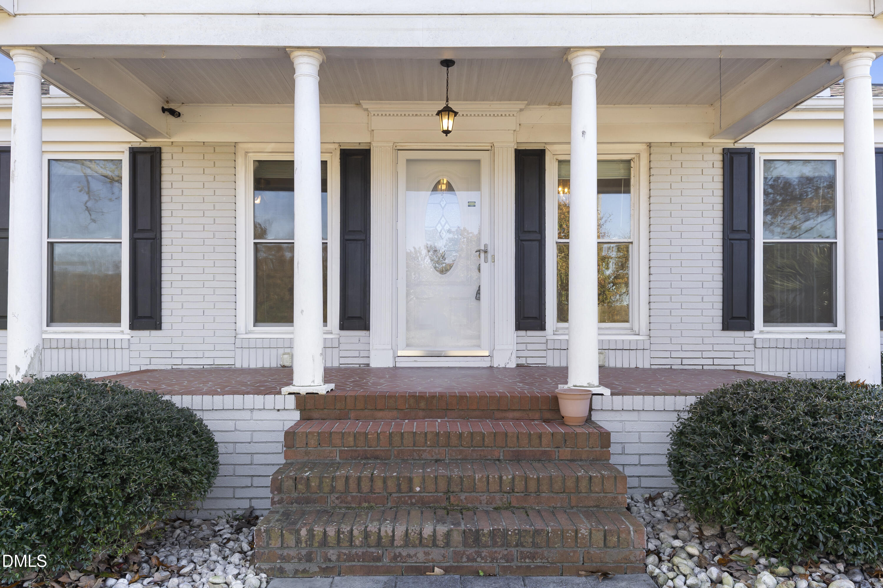 5575 Straw Pond School Road Godwin, NC 28344 - Photo 6 of 66 a front view of a house with a garden