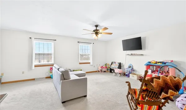 a bedroom with furniture and a couch