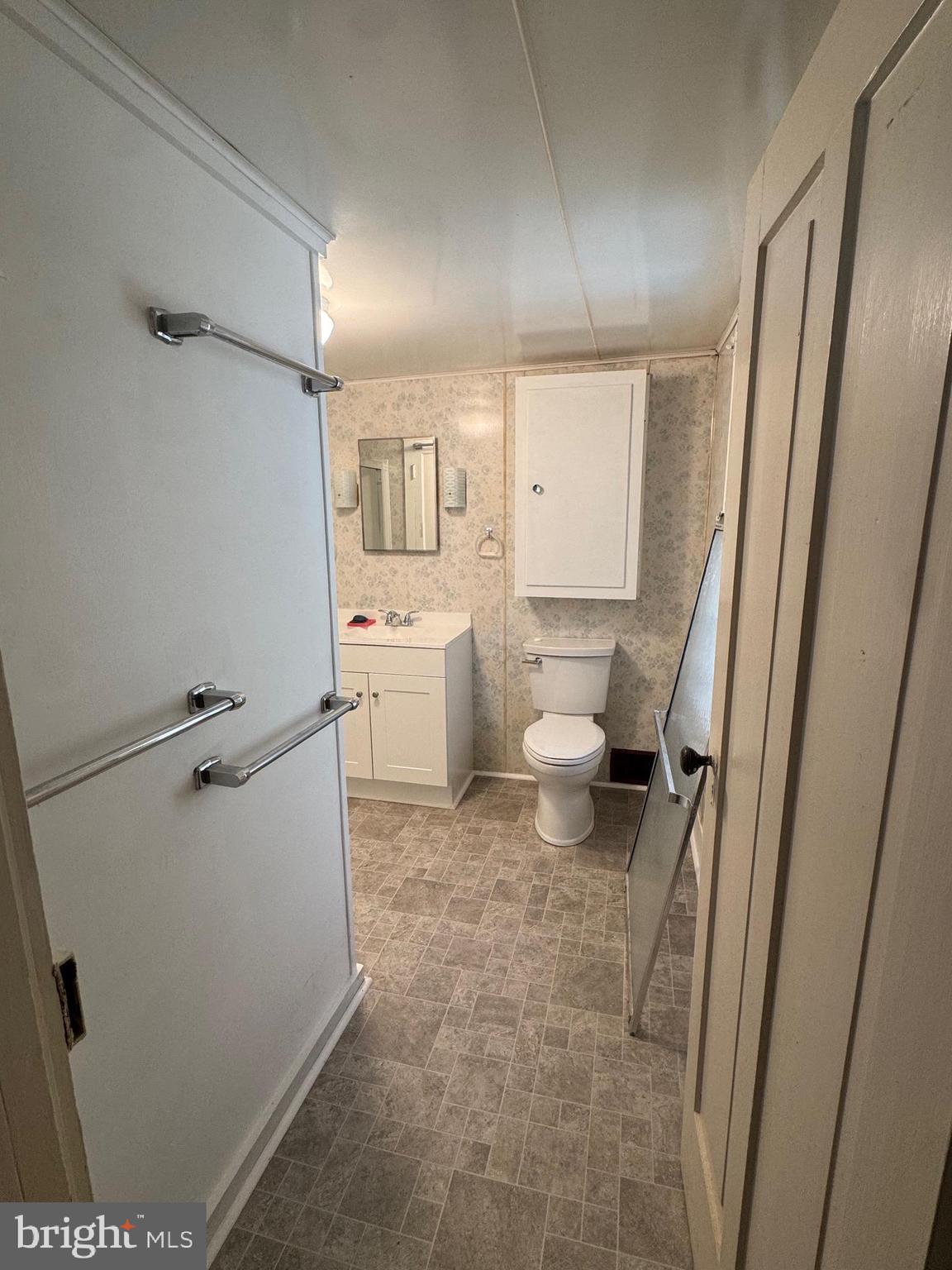 18250 South Fork Road Moorefield, WV 26836 - Photo 20 of 76 a bathroom with a sink a toilet and a shower