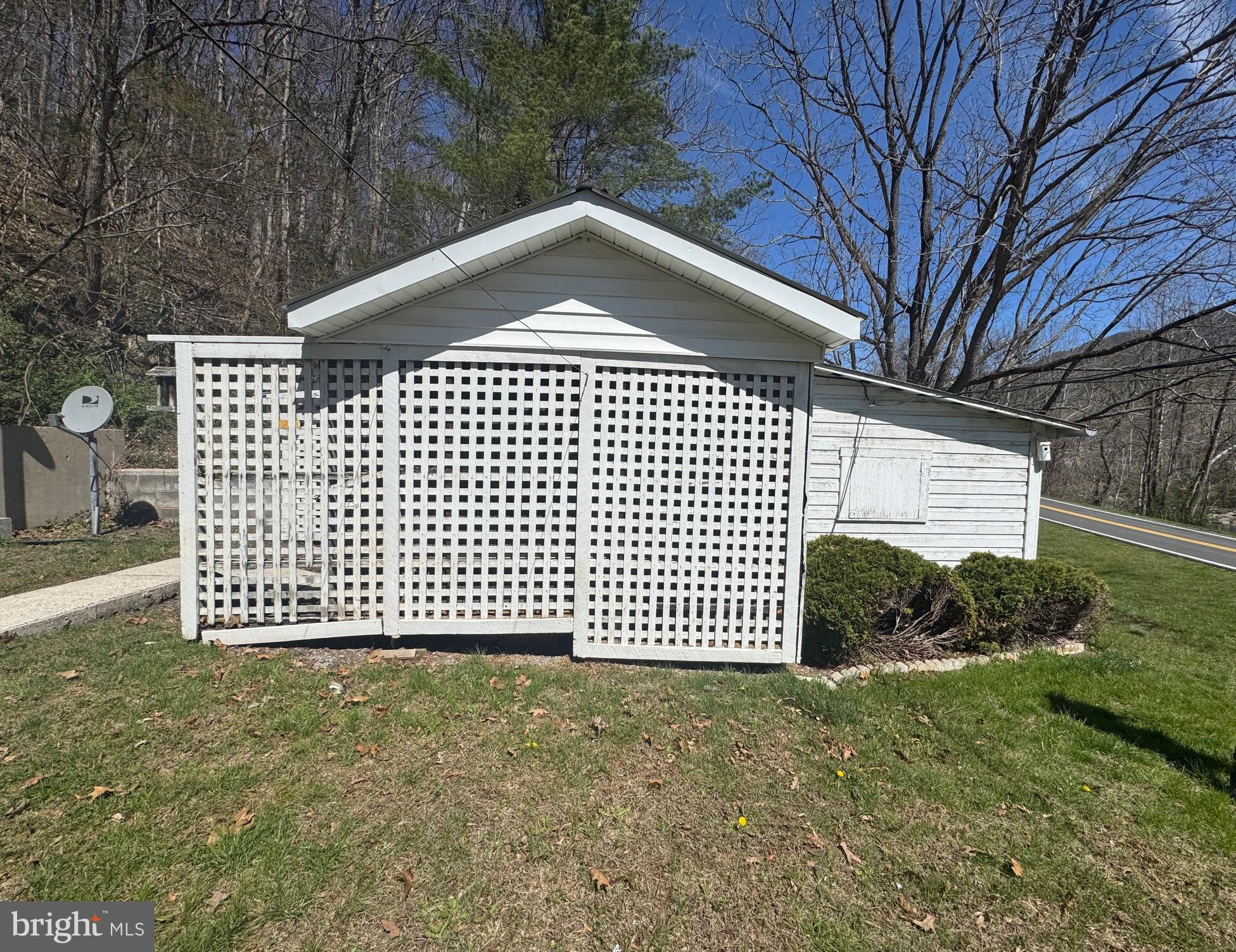 18250 South Fork Road Moorefield, WV 26836 - Photo 42 of 76 a front view of a house with a garden