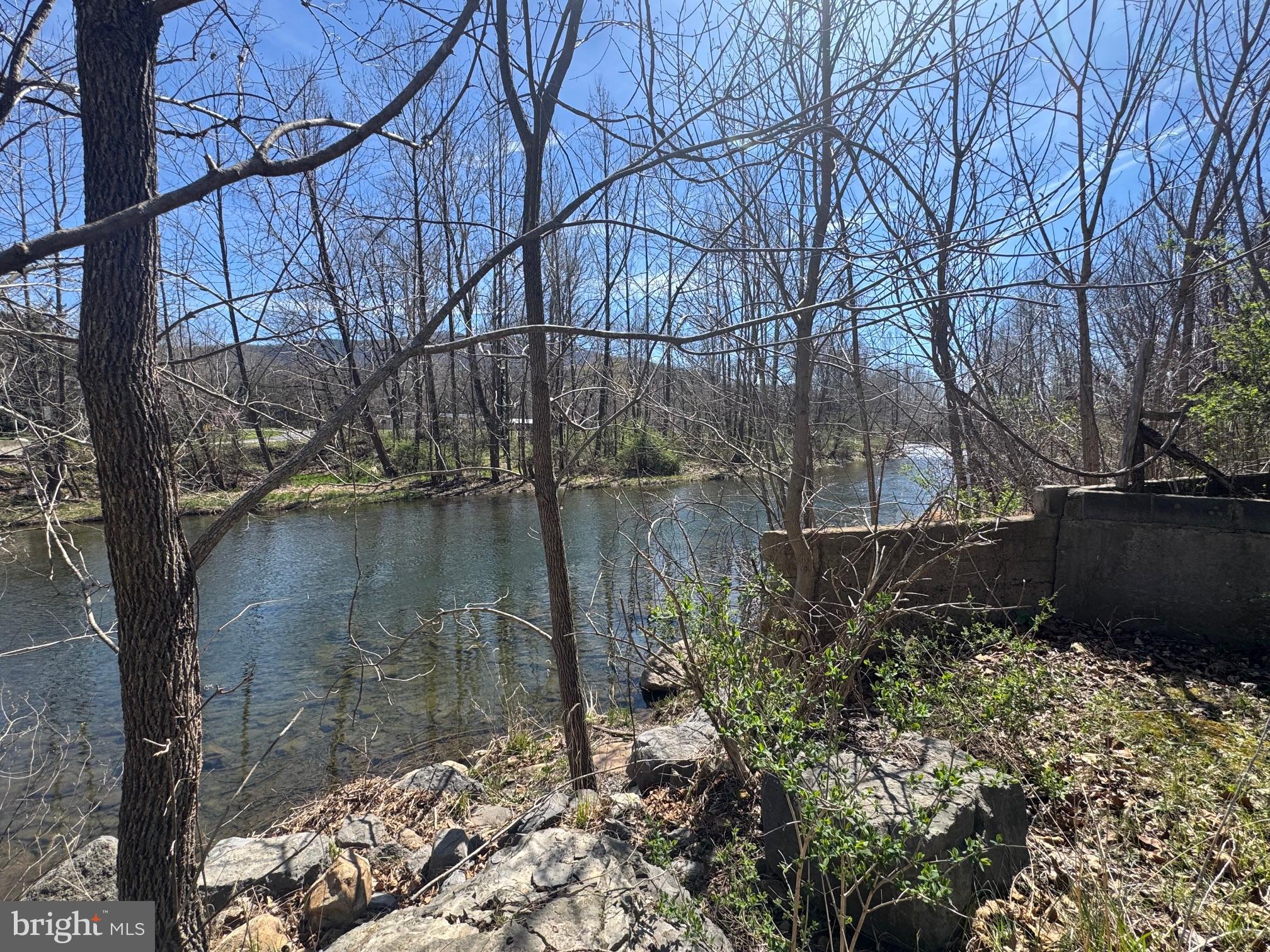 18250 South Fork Road Moorefield, WV 26836 - Photo 60 of 76 a backyard of a house with lots of green space