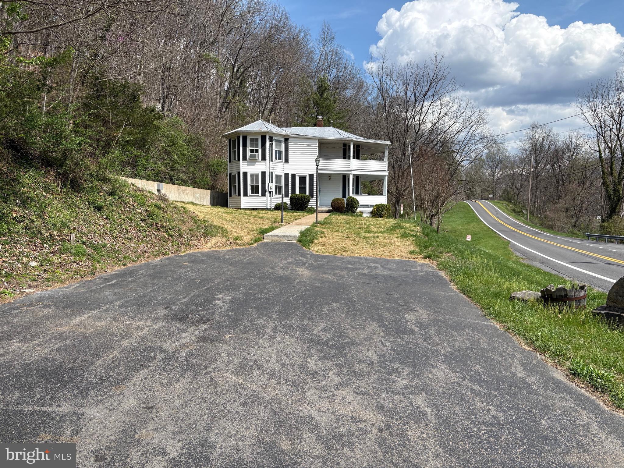18250 South Fork Road Moorefield, WV 26836 - Photo 68 of 76 a view of a house with a yard and sitting area