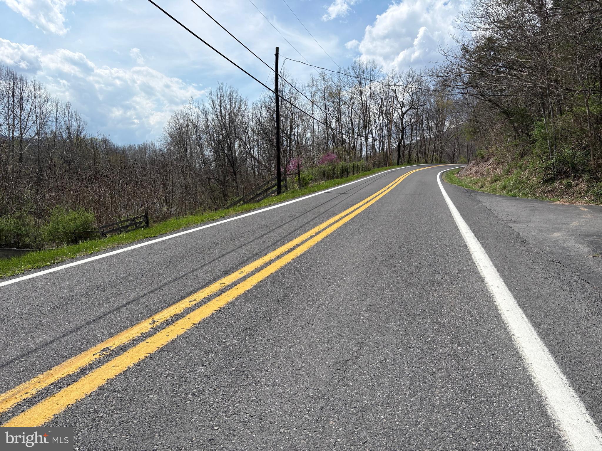 18250 South Fork Road Moorefield, WV 26836 - Photo 71 of 76 a view of balcony with yard and trees in the background