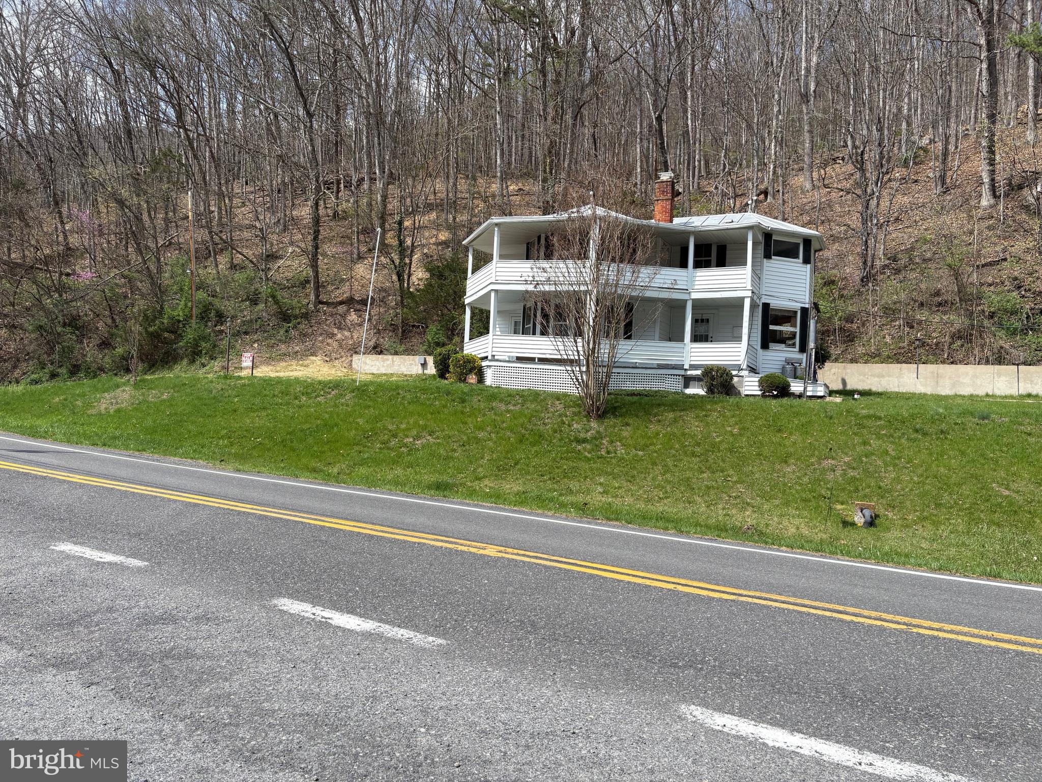 18250 South Fork Road Moorefield, WV 26836 - Photo 76 of 76 a view of a house with a big yard and large trees