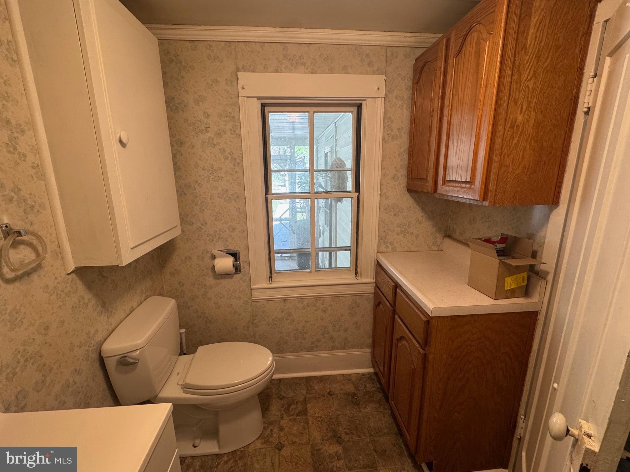 18250 South Fork Road Moorefield, WV 26836 - Photo 10 of 76 a bathroom with a sink a toilet and tub