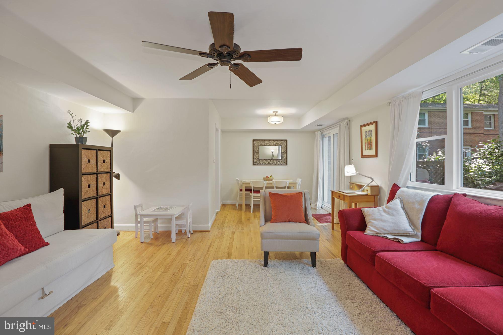 8519 Bradford Road, Unit 62 Silver Spring, MD 20901 - Photo 8 of 25 Family Room with Refinished Hardwood Floors