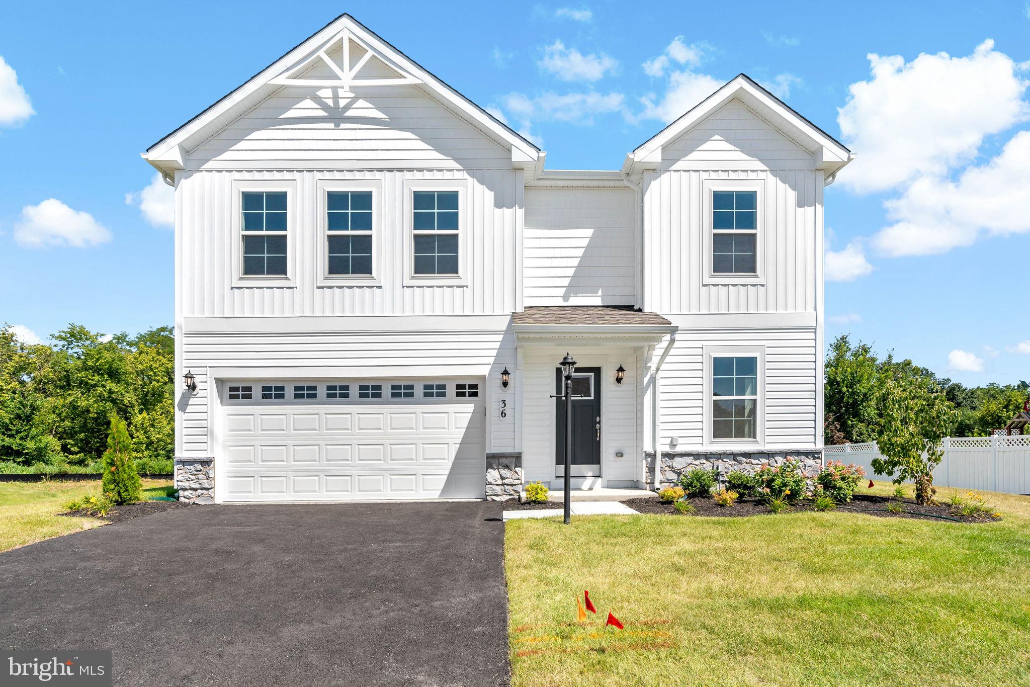 a front view of a house with swimming pool