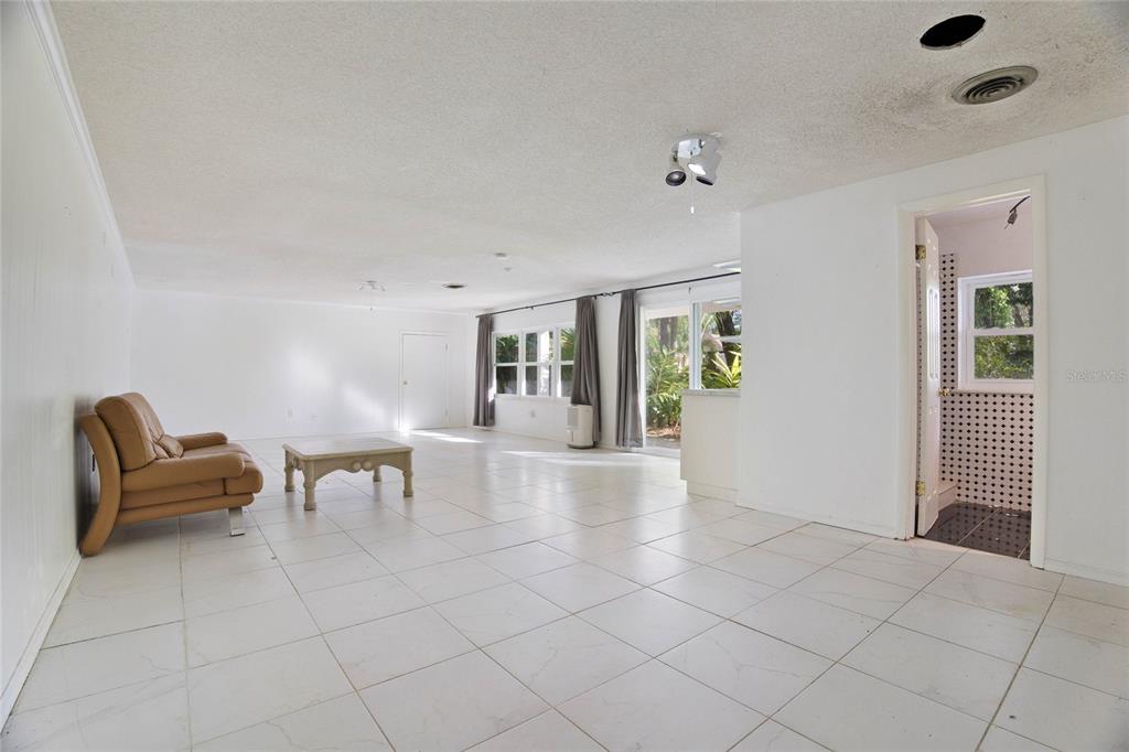 2667 Spring Court DeLand, FL 32720 - Photo 20 of 29 DOWNSTAIRS BEDROOM 1 with own bath