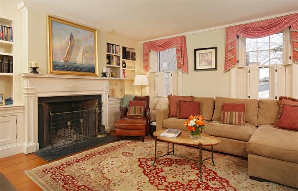 100 High Street Boston, MA 02129 - Photo 2 of 12 a living room with furniture and a fireplace