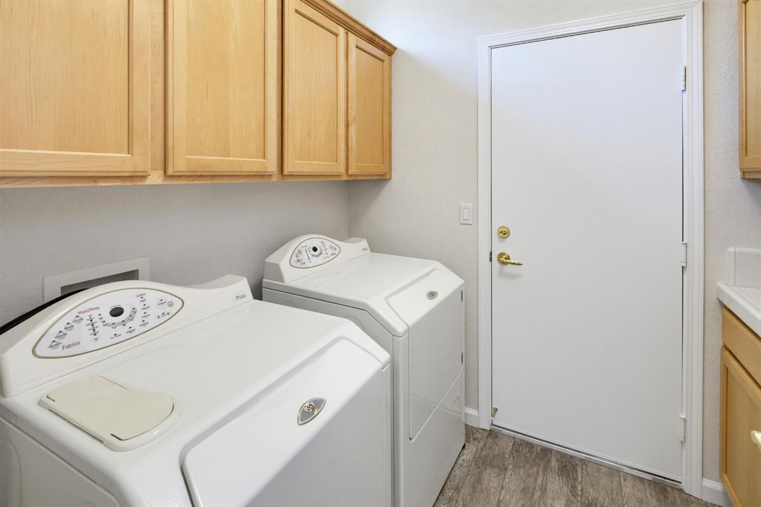 274 Lariat Loop Lincoln, CA 95648 - Photo 23 of 34 Inside Laundry Room w/Extra Storage & Folding Bar