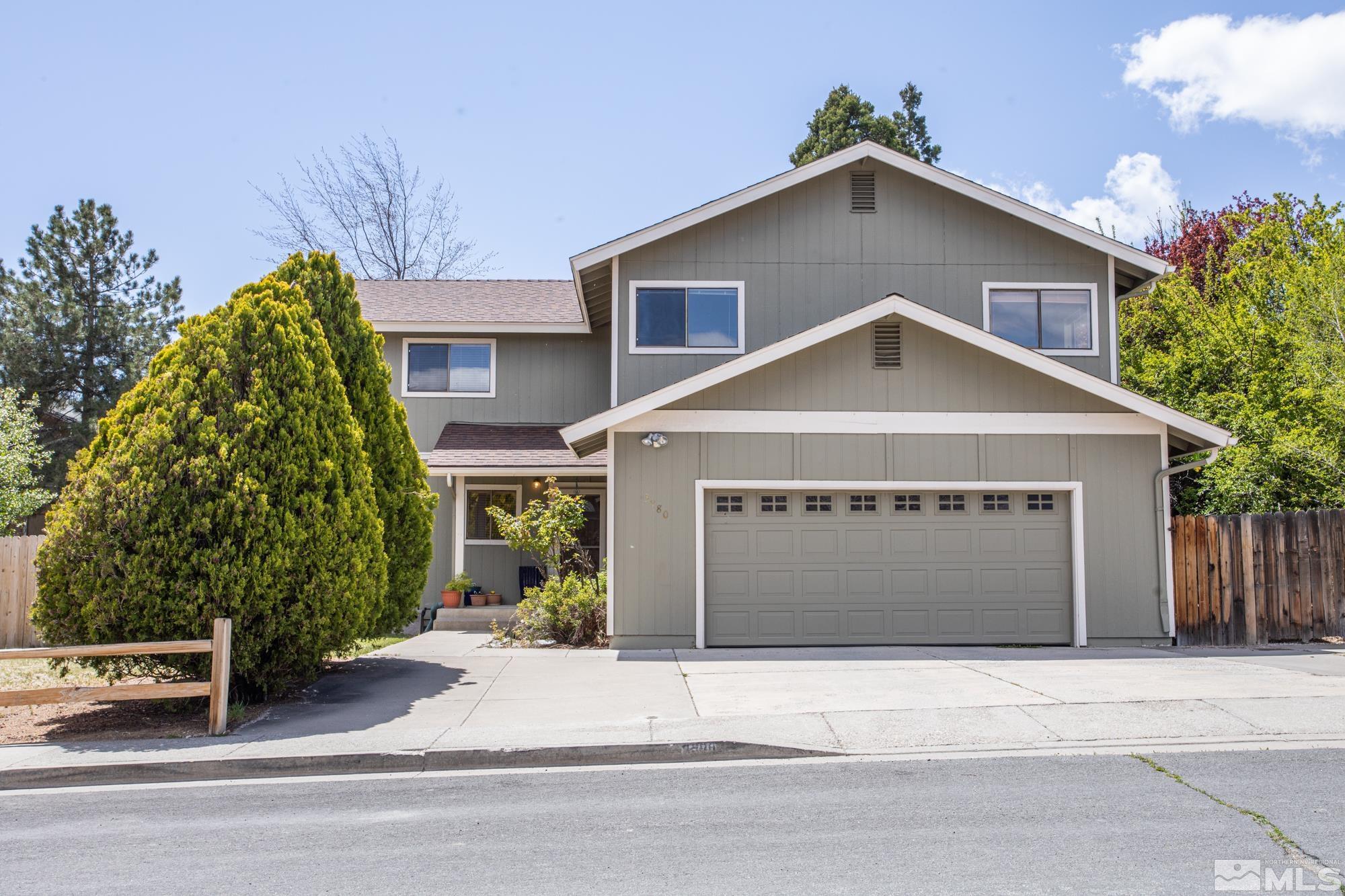 3980 Kings Row Reno, NV 89503 - Photo 1 of 35 a front view of a house with a garage