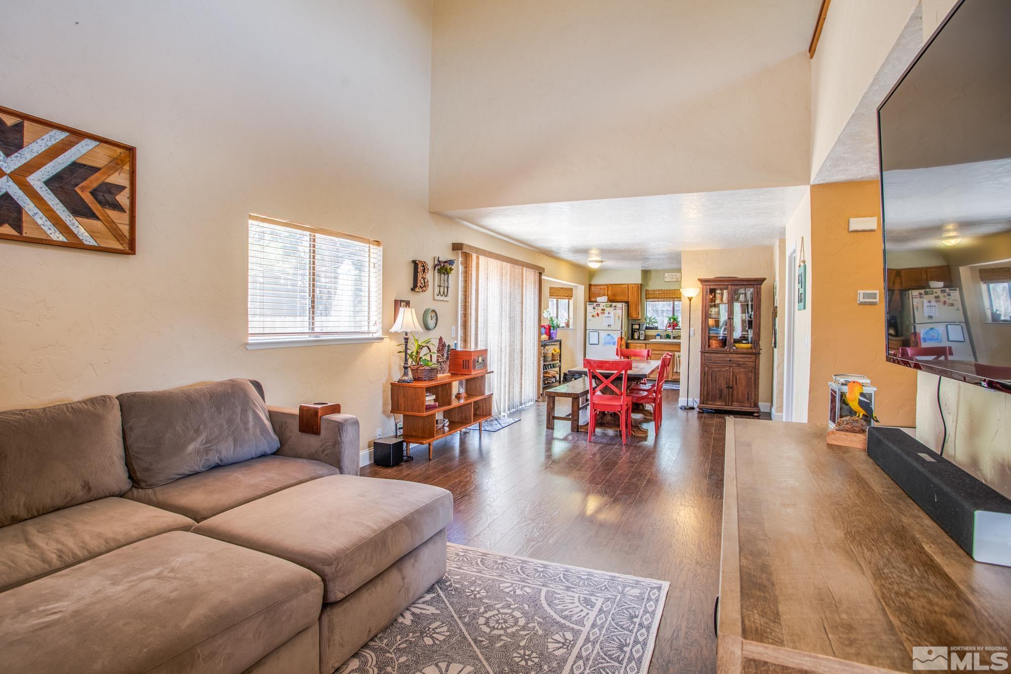 3980 Kings Row Reno, NV 89503 - Photo 8 of 35 a living room with furniture and wooden floor