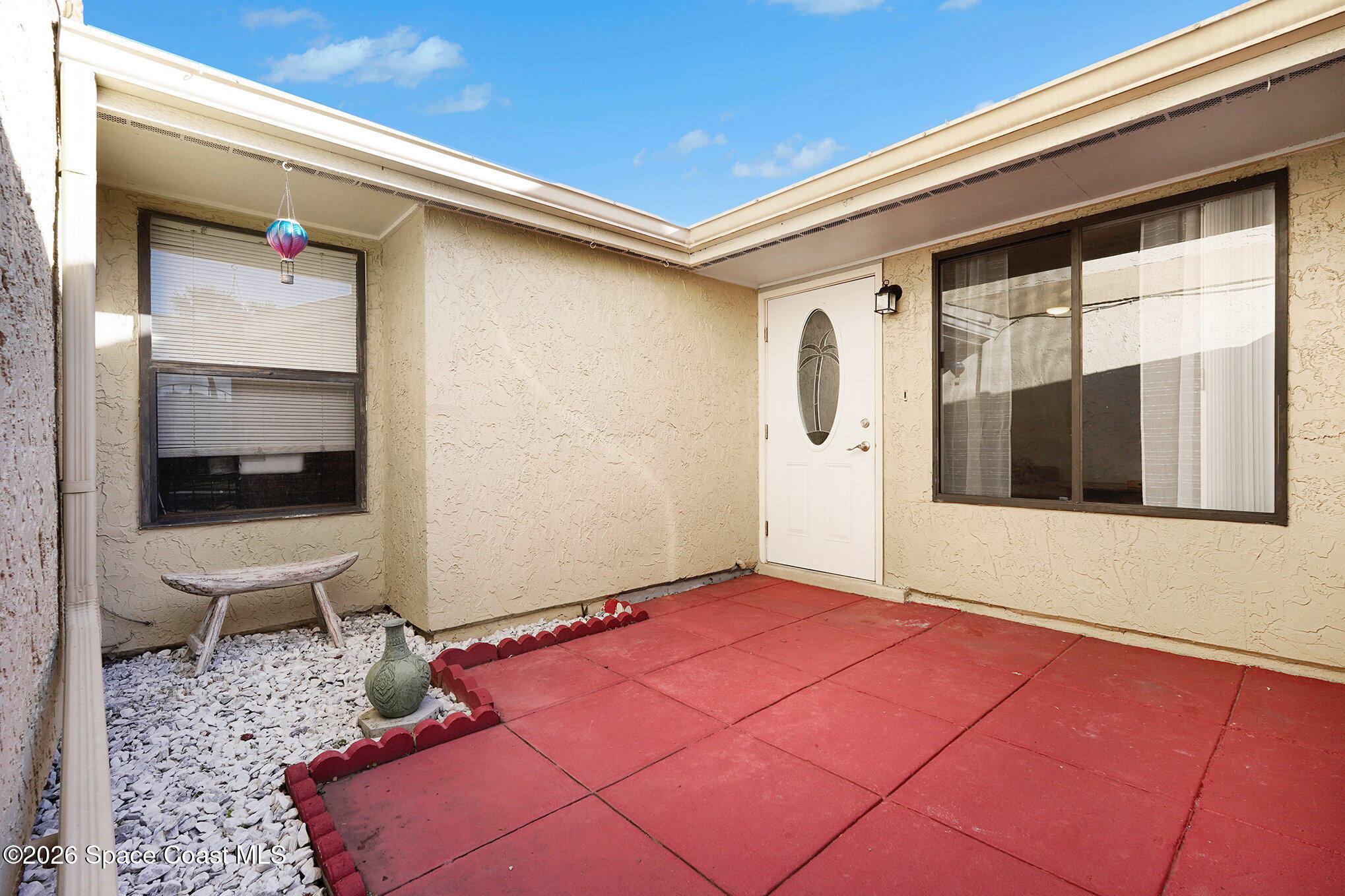 1491 Sheafe Avenue Northeast, Unit 104 Palm Bay, FL 32905 - Photo 16 of 19 a view of an outdoor space