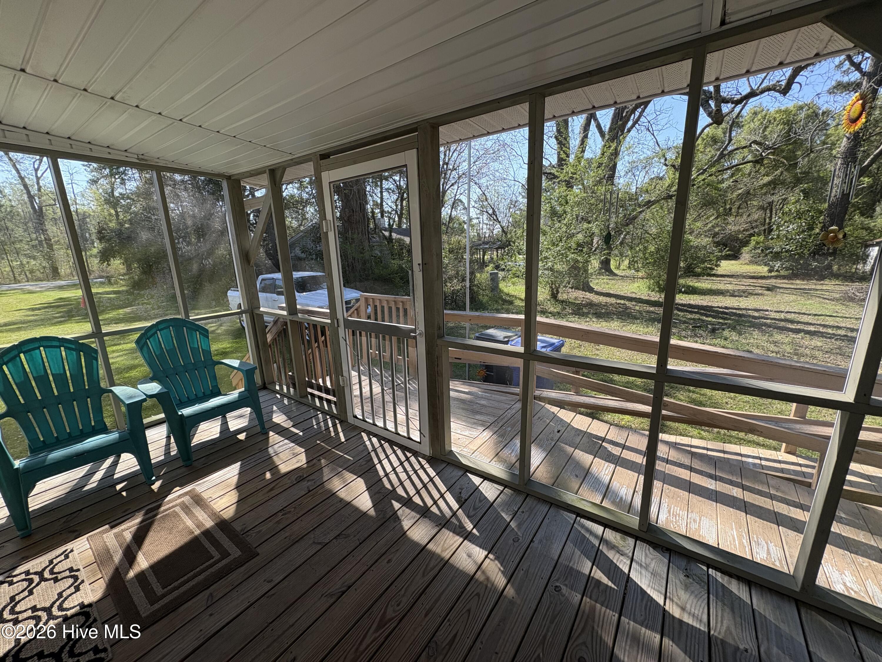 312 Fire Tower Road Lake Waccamaw, NC 28450 - Photo 12 of 26 Screened in porch
