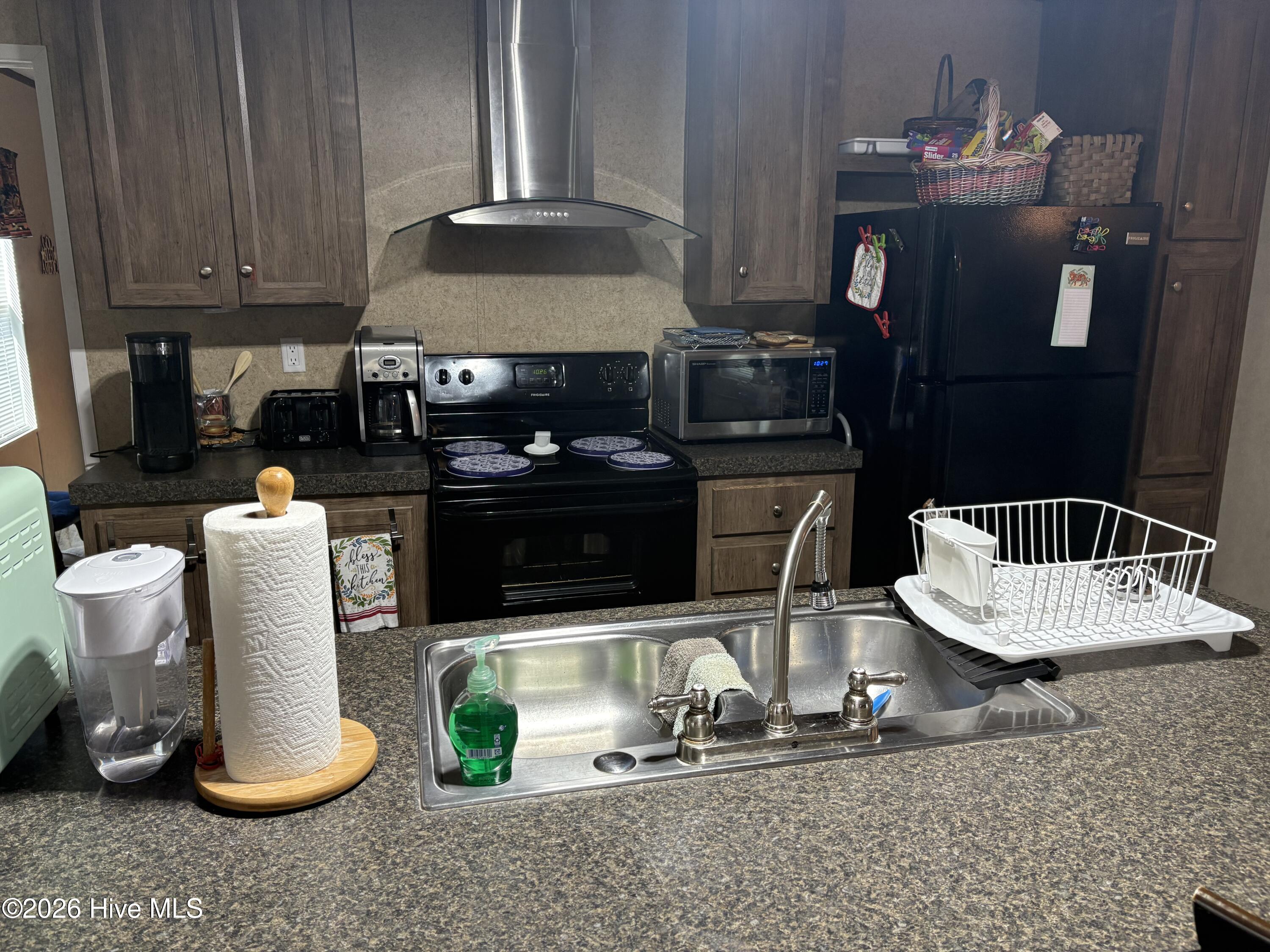 312 Fire Tower Road Lake Waccamaw, NC 28450 - Photo 16 of 26 Kitchen-Dining Comb