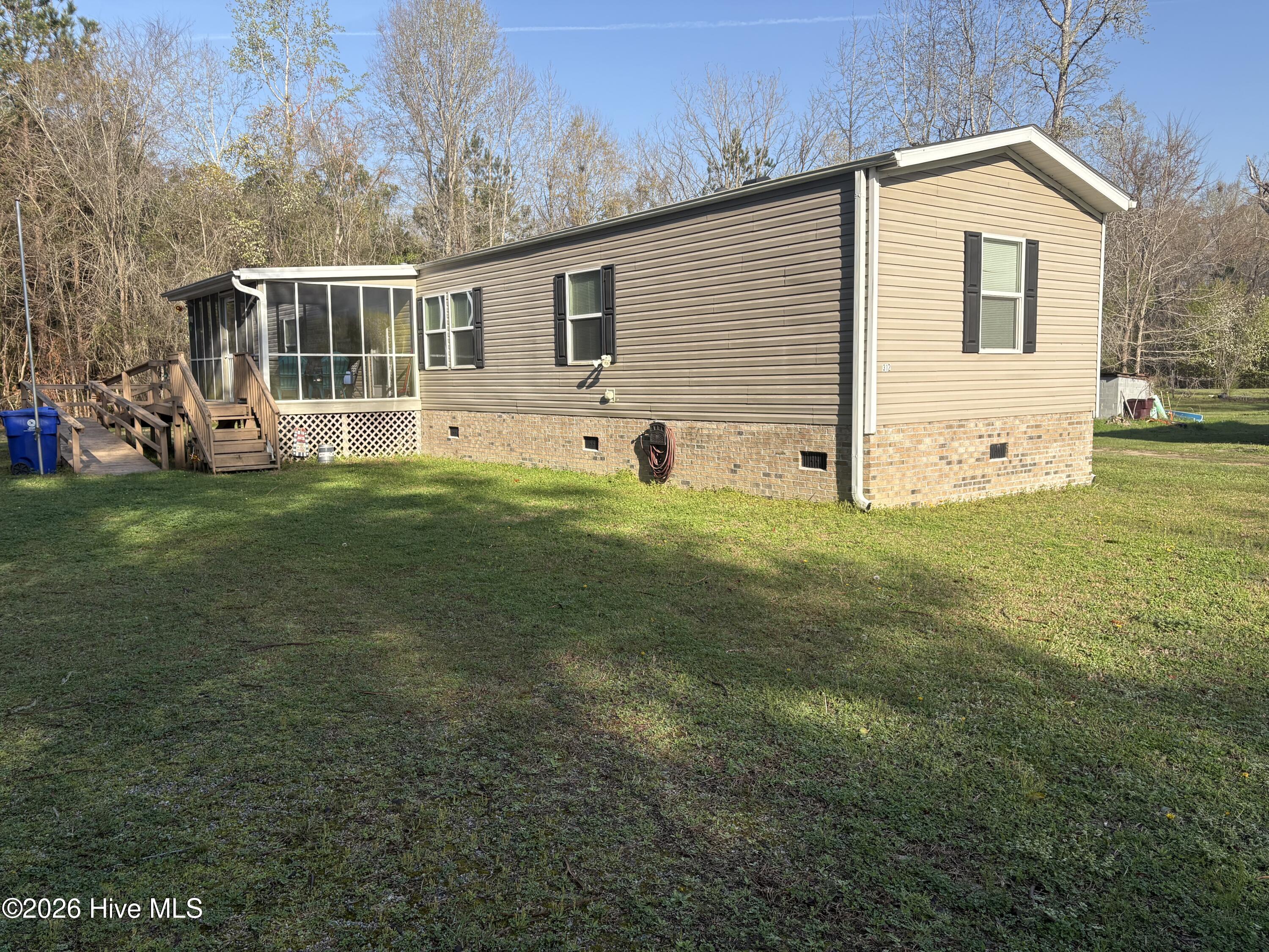 312 Fire Tower Road Lake Waccamaw, NC 28450 - Photo 2 of 26 Front View