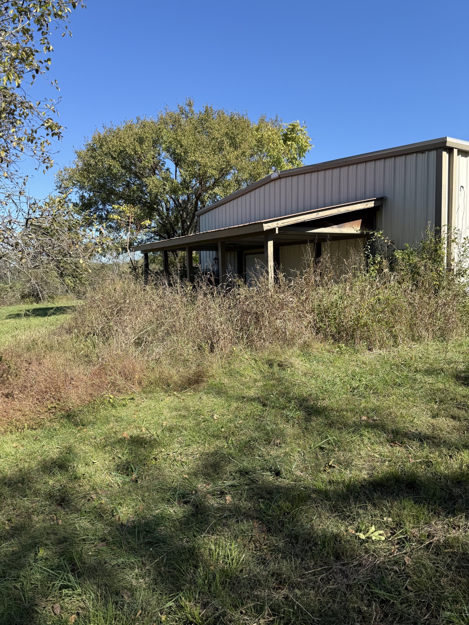 8475 Crawley Hill Road Mount Pleasant, TN 38474 - Photo 41 of 41 a backyard of a house with lots of green space