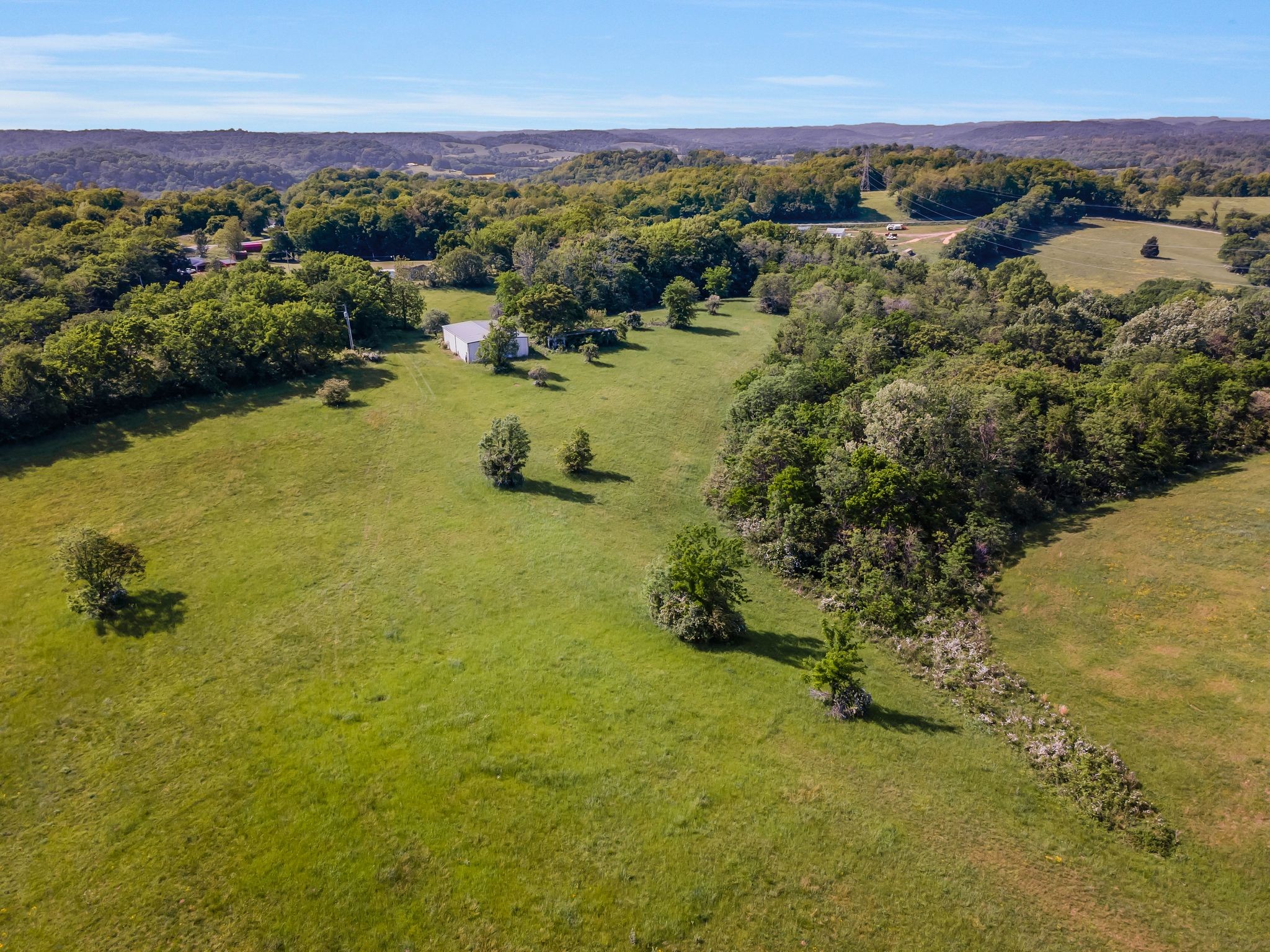 8475 Crawley Hill Road Mount Pleasant, TN 38474 - Photo 10 of 41 an aerial view of ocean with residential house with outdoor space