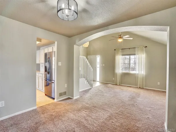 en view of an empty room with glass door