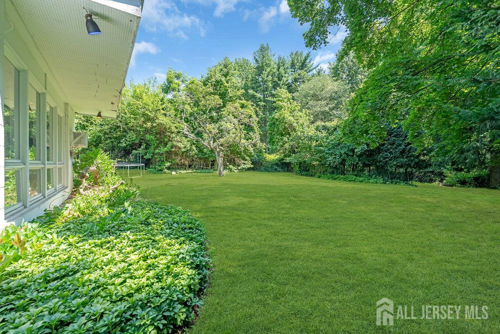 21 Homestead Lane Roosevelt, NJ 08555 - Photo 21 of 24 a view of a trees with a yard