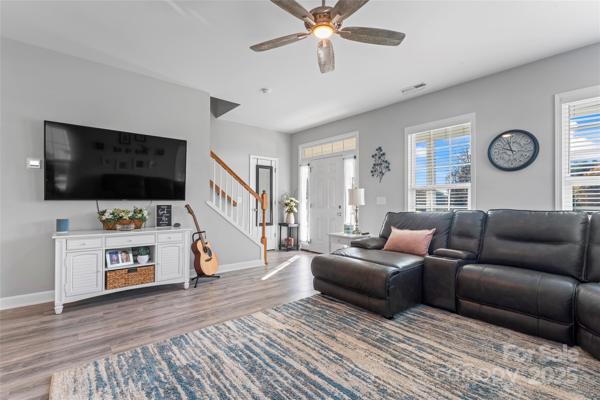 3839 Robinson Circle Gastonia, NC 28056 - Photo 11 of 46 a living room with furniture and a flat screen tv