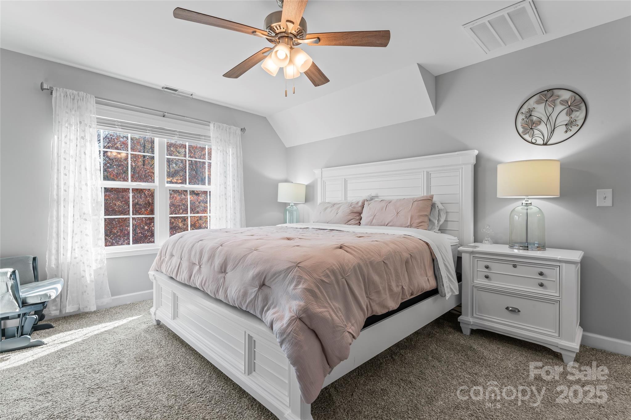 3839 Robinson Circle Gastonia, NC 28056 - Photo 21 of 46 a spacious bedroom with a bed and a window
