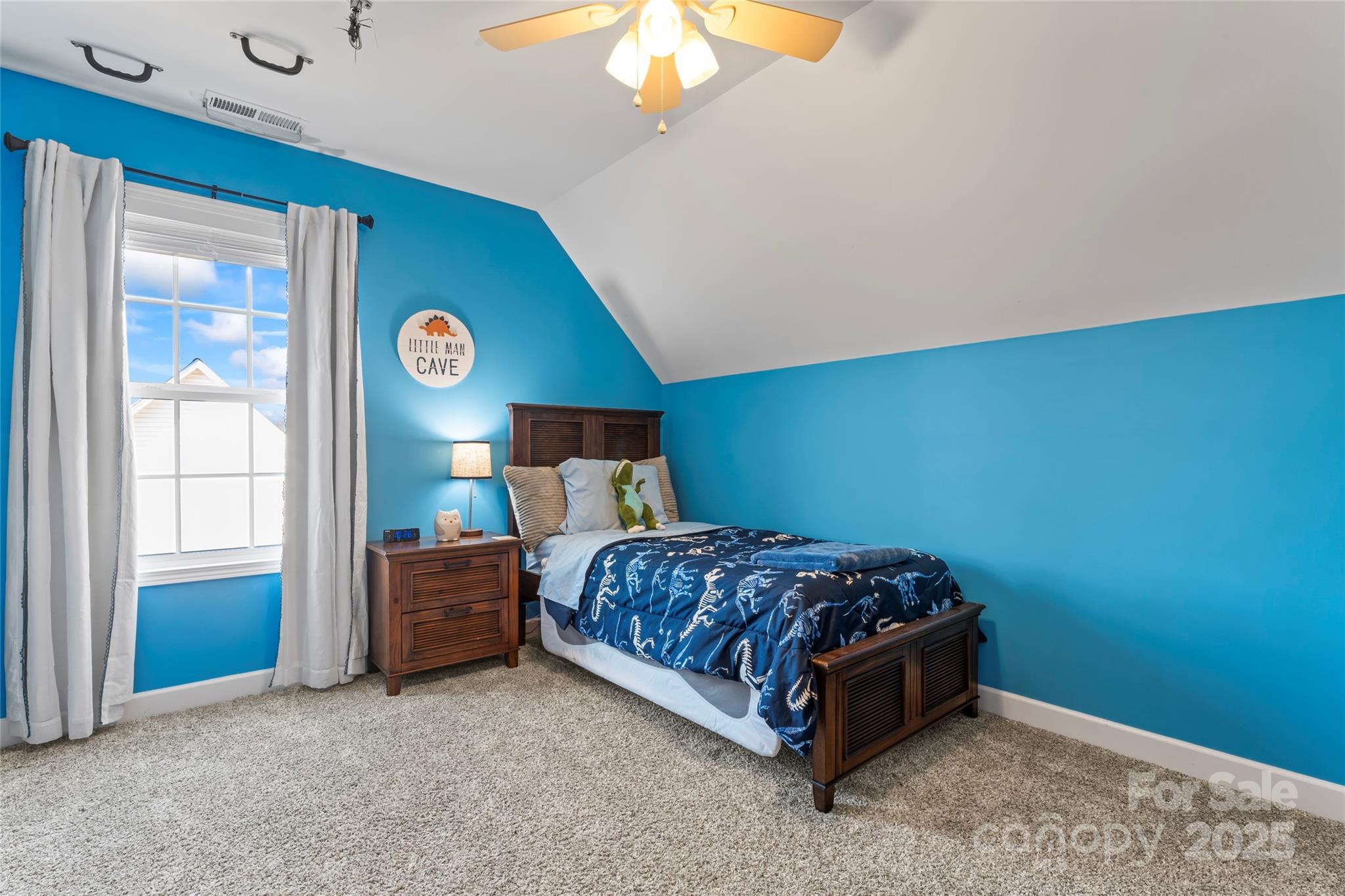 3839 Robinson Circle Gastonia, NC 28056 - Photo 28 of 46 a bed sitting in a room next to a window