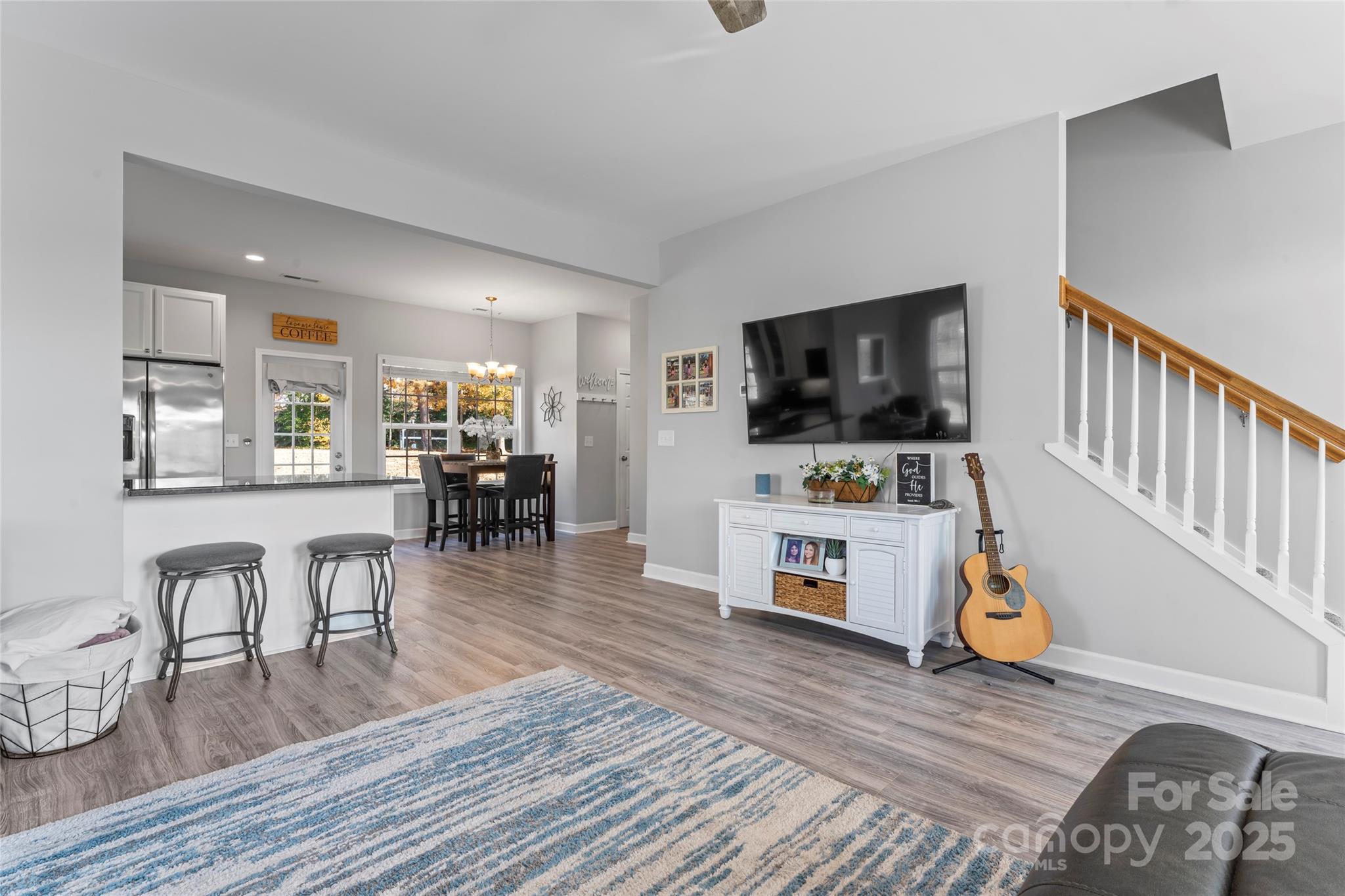 3839 Robinson Circle Gastonia, NC 28056 - Photo 10 of 46 a living room with furniture and a flat screen tv