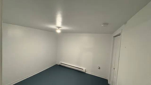 an empty room with a workbench