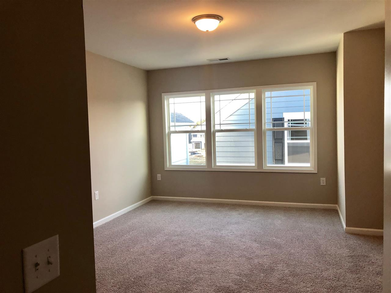 5200 Beckom Street, Unit 2204 Raleigh, NC 27616 - Photo 15 of 16 master bedroom example for this floorplan, finishes and structural details may vary.