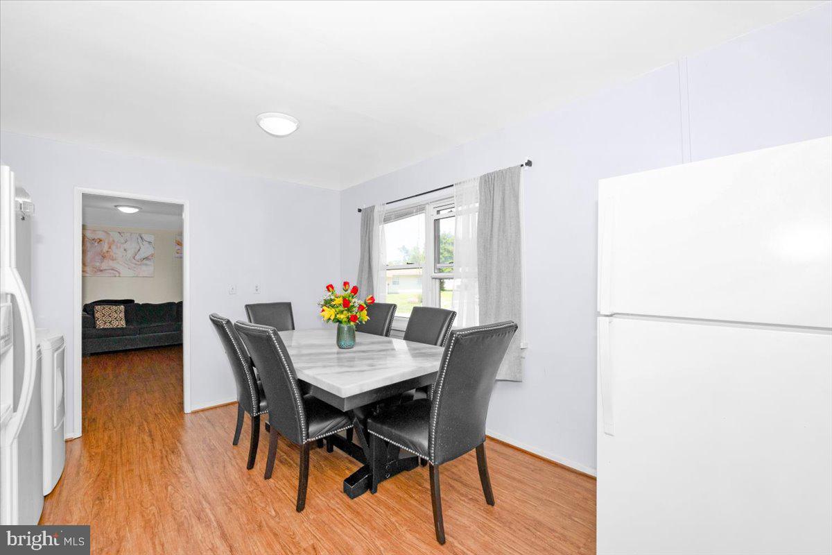 302 Manor Court Frederick, MD 21701 - Photo 14 of 33 Bright and inviting dining space.