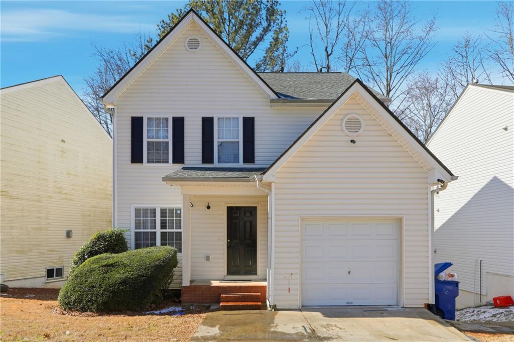 265 Springbottom Drive Southeast Lawrenceville, GA 30046 - Photo 1 of 30 a view of a white house