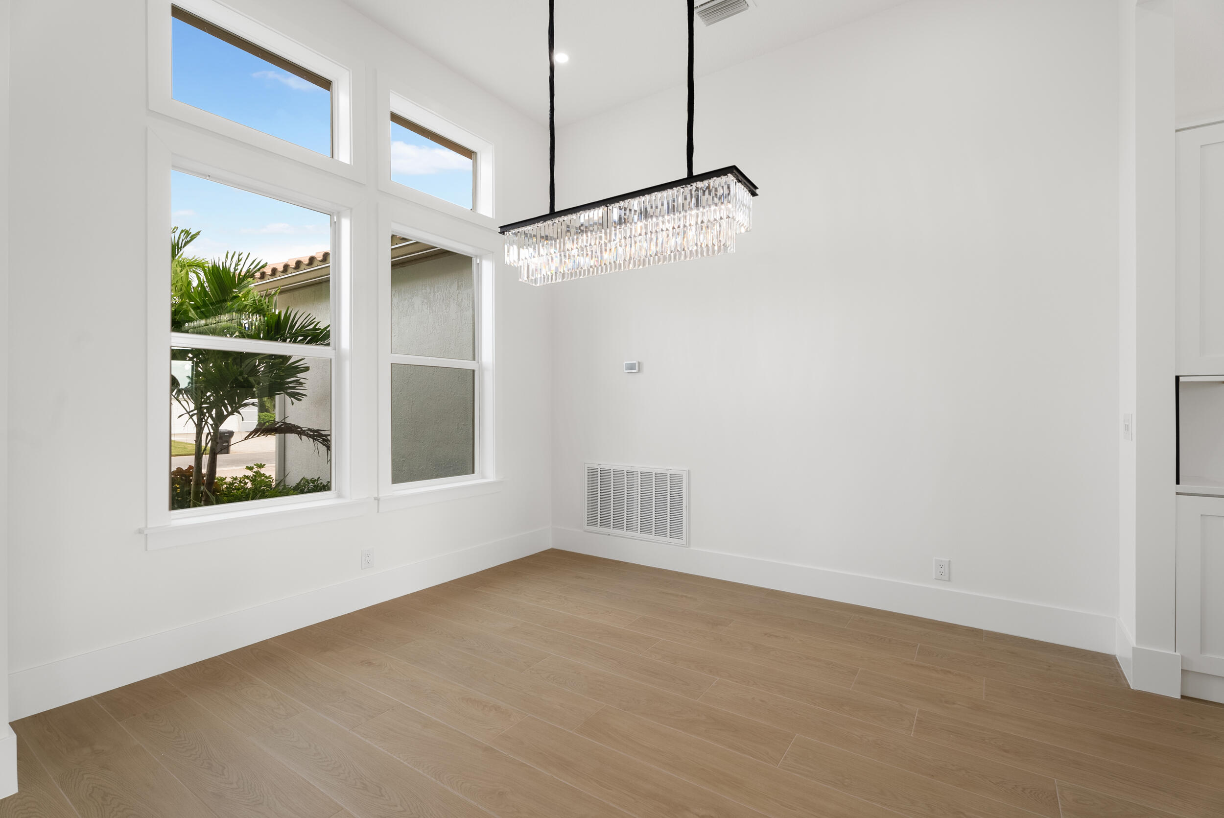 2218 Southeast Stonehaven Road Port St. Lucie, FL 34952 - Photo 11 of 48 a view of an empty room with a window