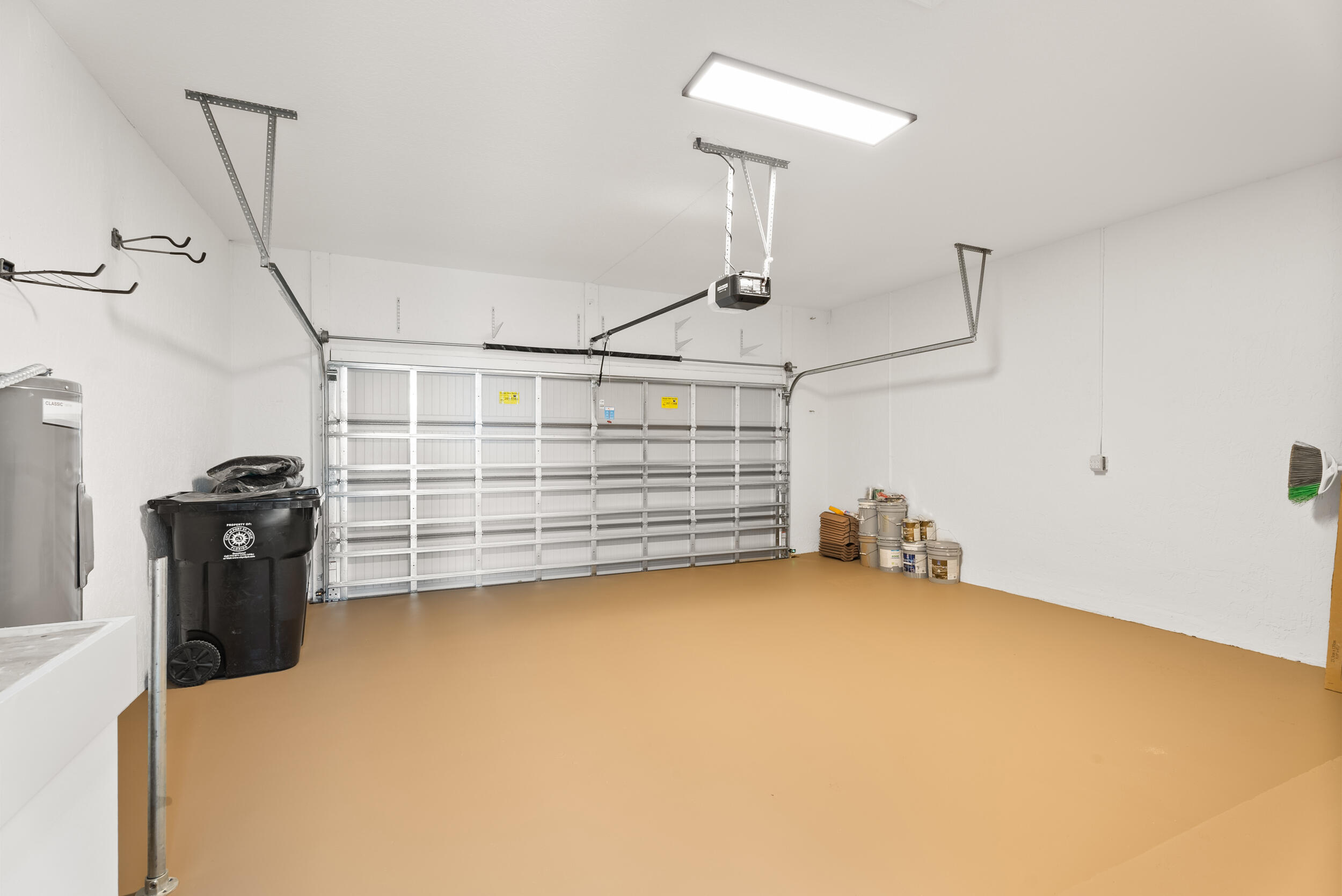 2218 Southeast Stonehaven Road Port St. Lucie, FL 34952 - Photo 40 of 48 a view of a garage with storage