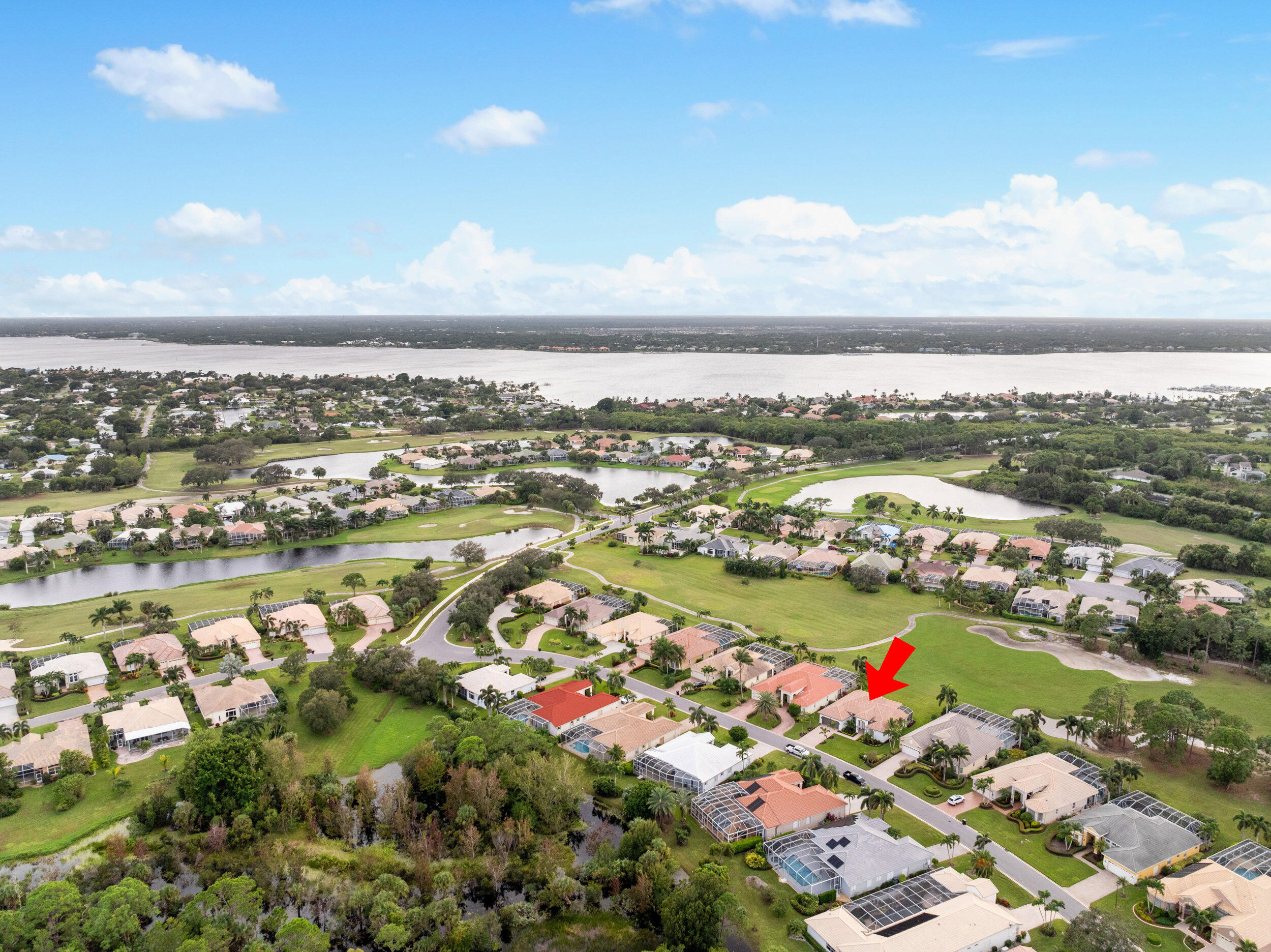 2218 Southeast Stonehaven Road Port St. Lucie, FL 34952 - Photo 46 of 48 an aerial view of city and lake