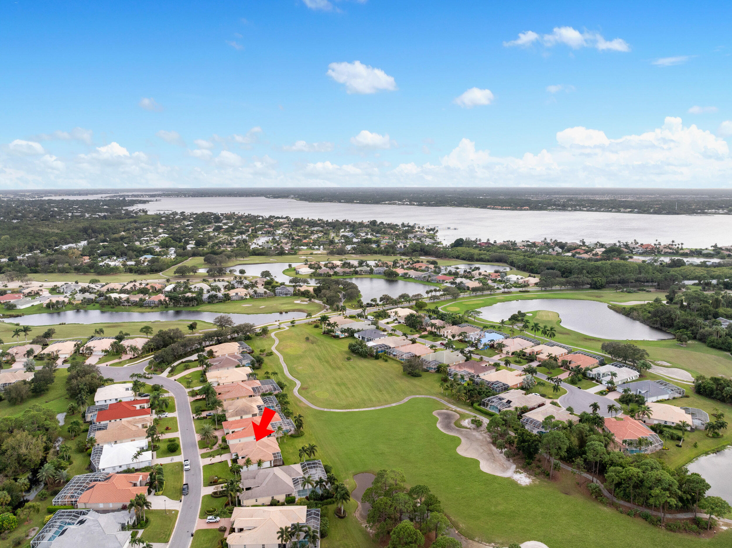 2218 Southeast Stonehaven Road Port St. Lucie, FL 34952 - Photo 48 of 48 an aerial view of city and lake