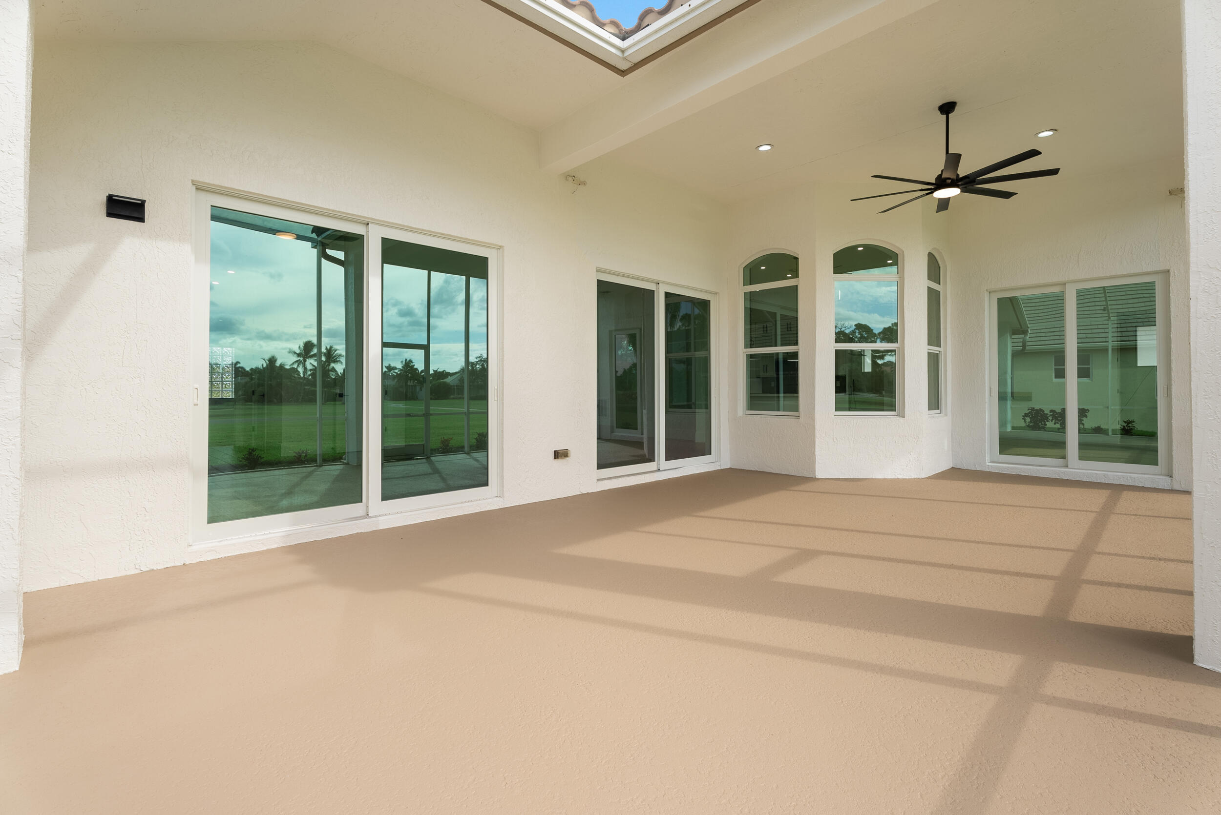 2218 Southeast Stonehaven Road Port St. Lucie, FL 34952 - Photo 7 of 48 a view of an entryway with a floor to ceiling window