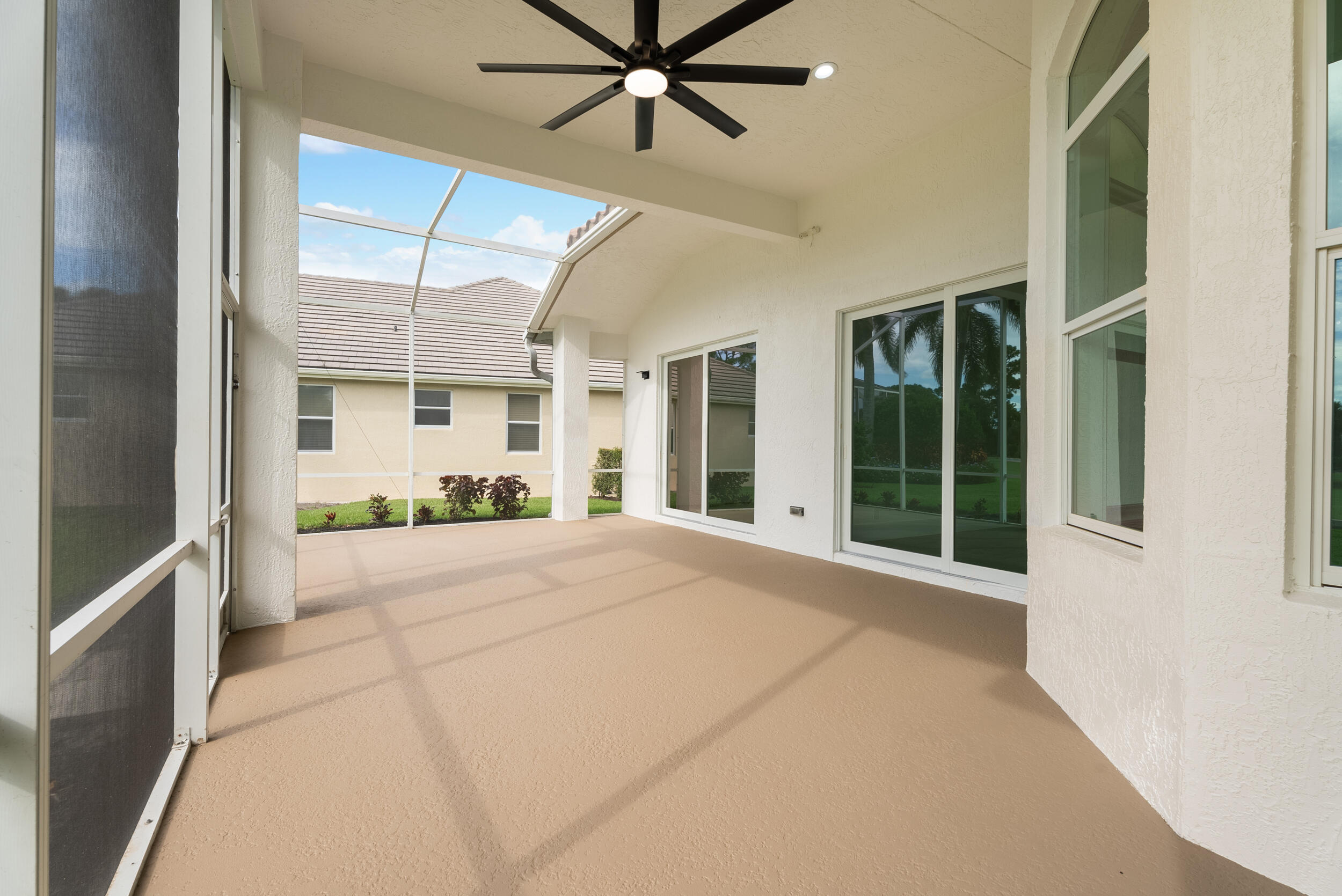 2218 Southeast Stonehaven Road Port St. Lucie, FL 34952 - Photo 8 of 48 a view of an entryway with a livingroom