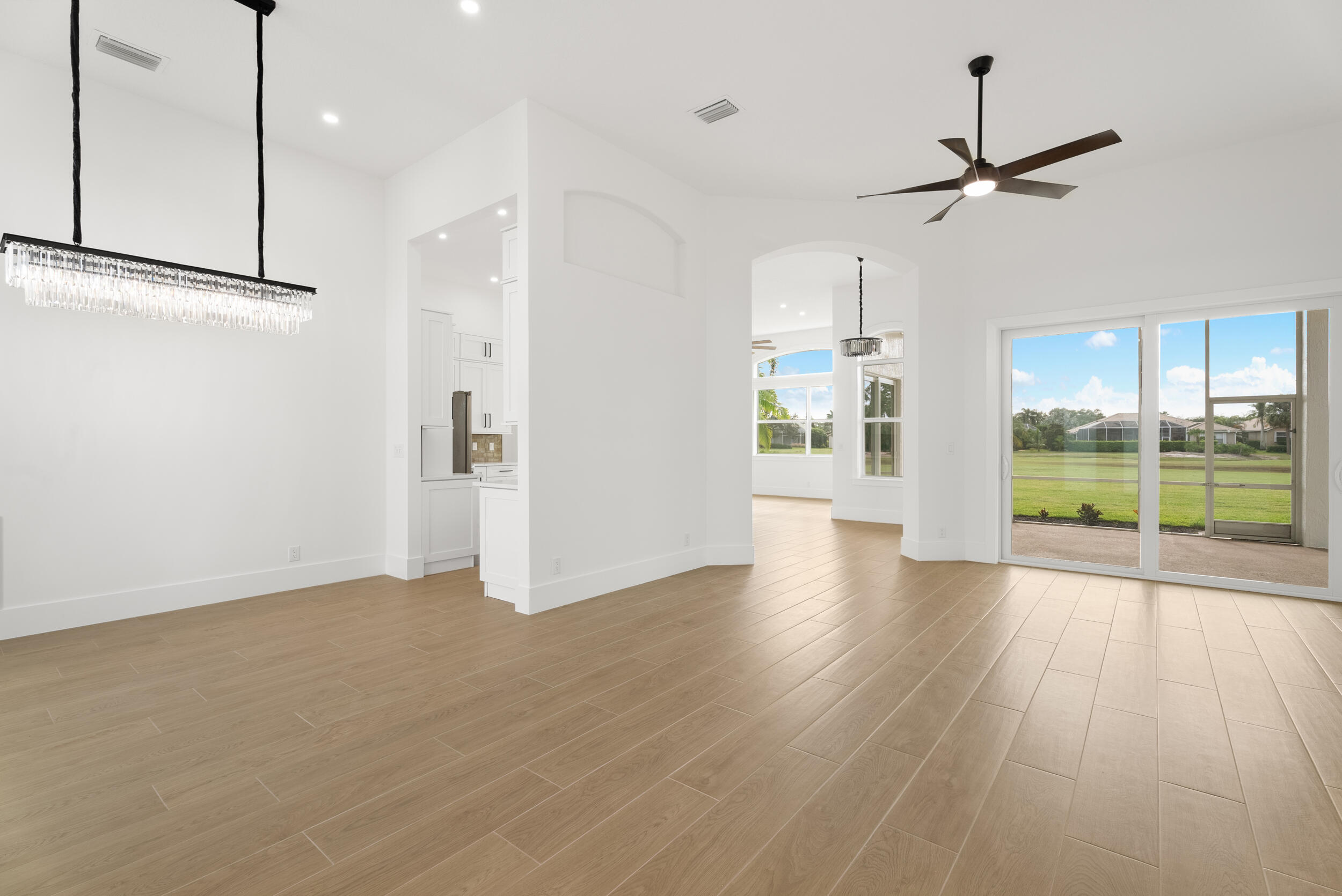 2218 Southeast Stonehaven Road Port St. Lucie, FL 34952 - Photo 10 of 48 a view of an empty room with a window